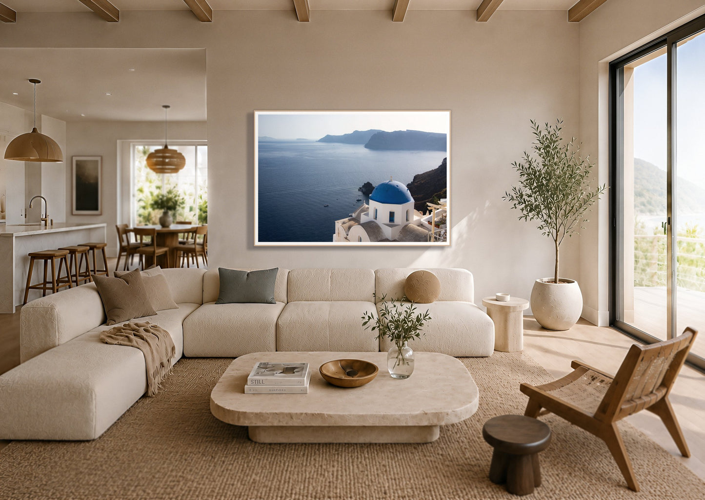 Blue Cap by Dylan Ozanich in an Oak frame, above a cream sectional in a coastal living room with an ocean view
