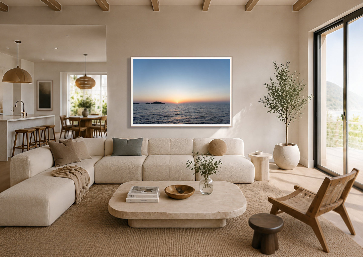 Greek Ocean by Dylan Ozanich in an Oak frame, above a cream sectional in a coastal living room with an ocean view