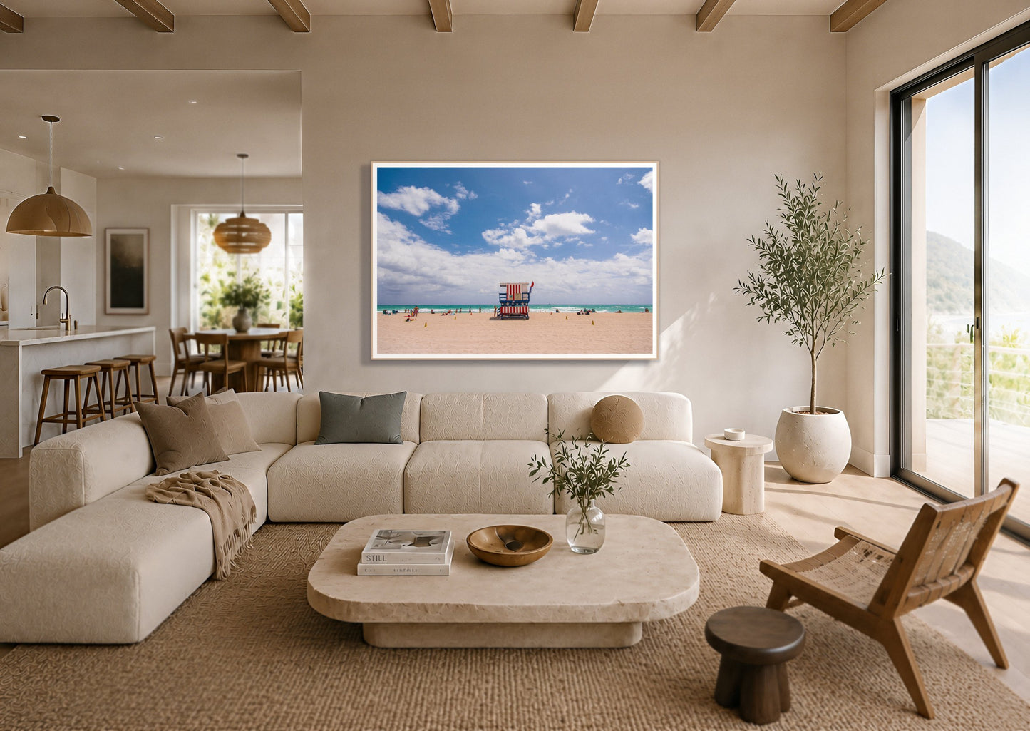 Miami by Dylan Ozanich in an Oak frame, above a cream sectional in a coastal living room with an ocean view