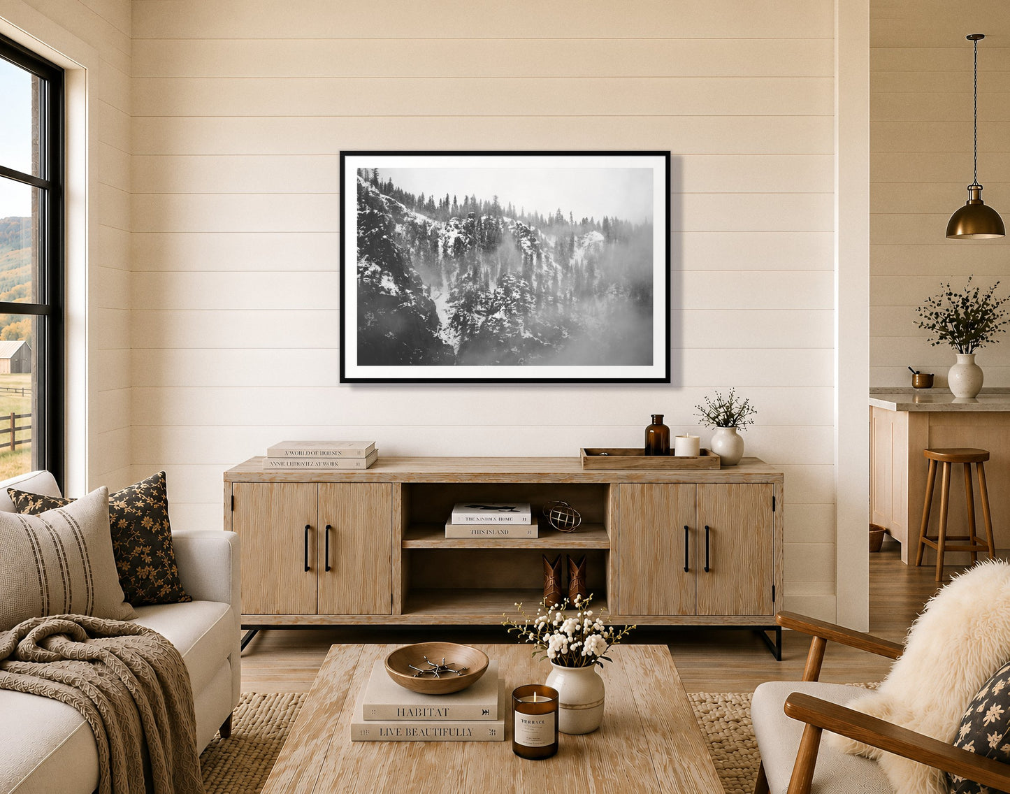SIerra Snow by Dylan Ozanich in a Black frame, on a shiplap wall above an oak credenza in a modern farmhouse living room