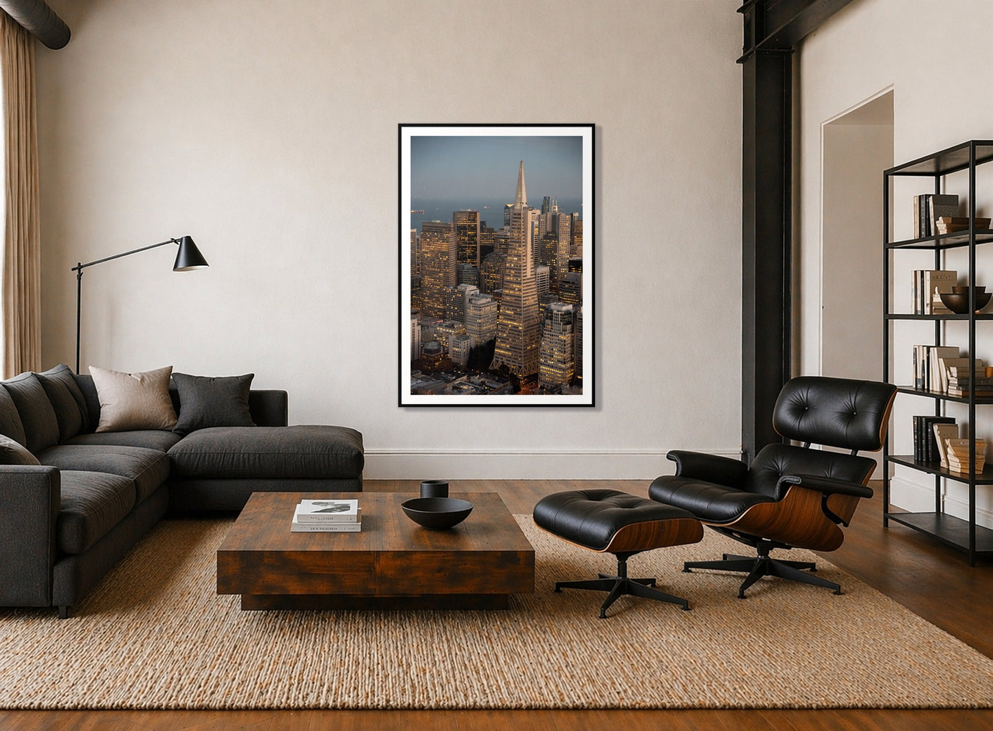Transamerica San Francisco by Dylan Ozanich in a Black frame, above a dark sectional in a loft with a black leather lounge chair