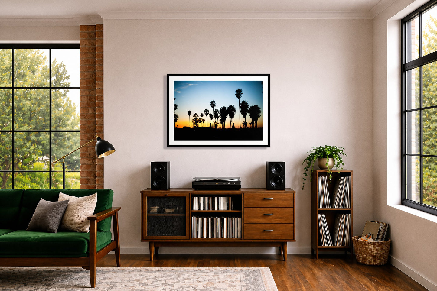 Venice Beach by Dylan Ozanich in a Black frame, above a record credenza in a listening room with a green velvet sofa
