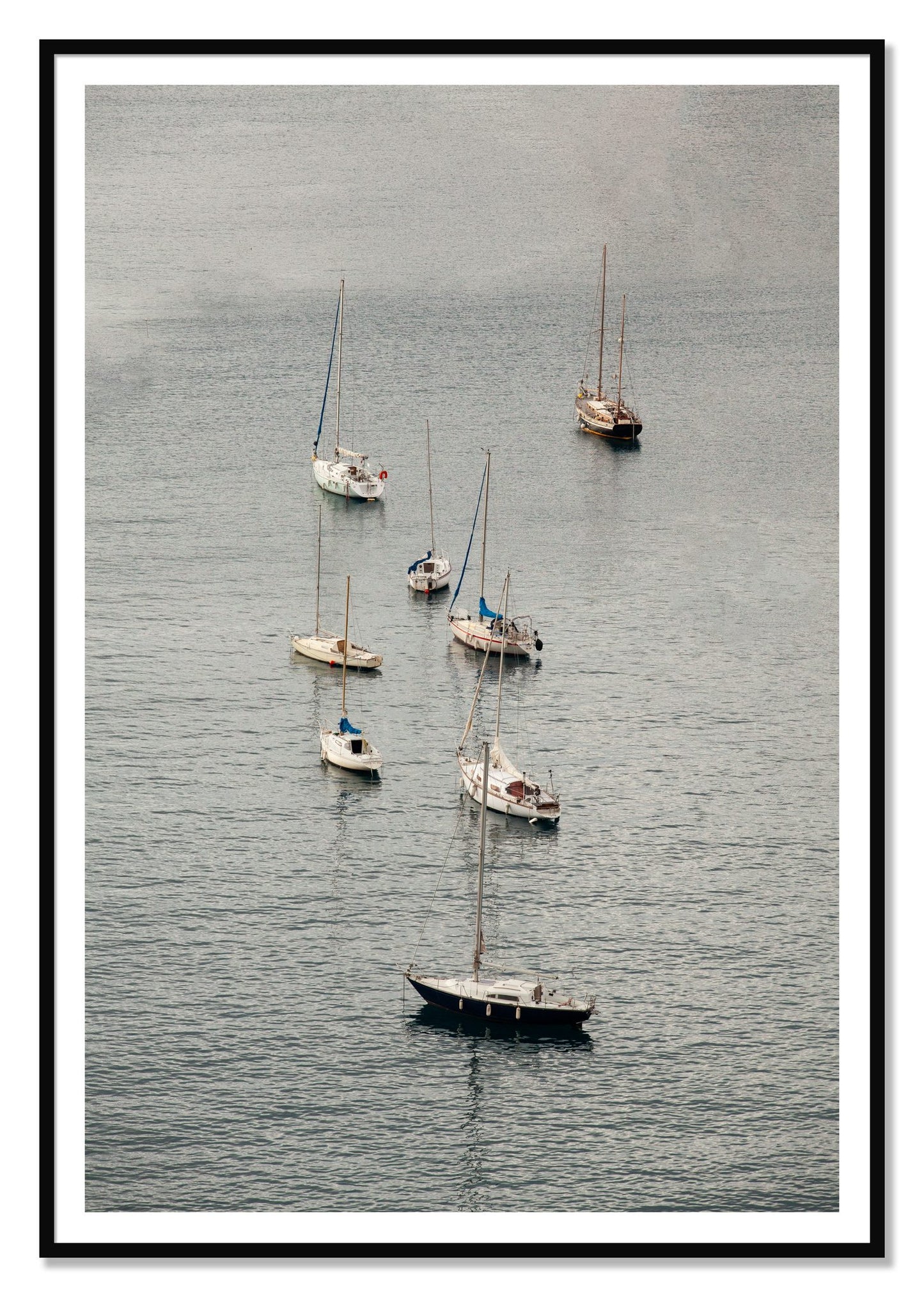 Anchored by Dylan Ozanich, 48×72 print with a White Border in a Black frame