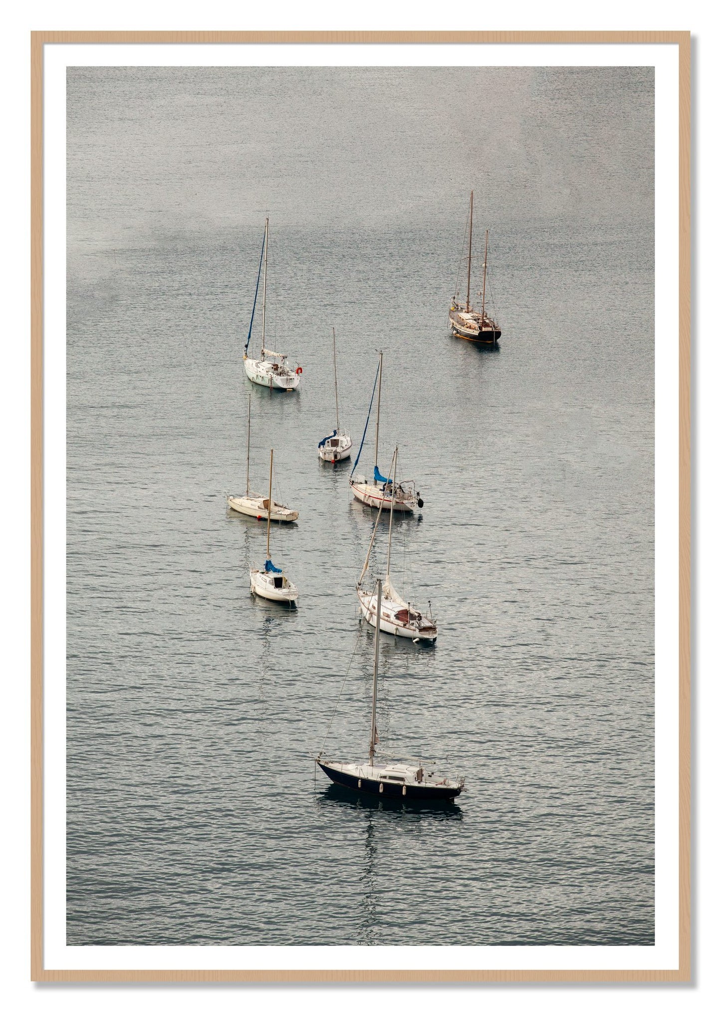 Anchored by Dylan Ozanich, 48×72 print with a White Border in an Oak frame