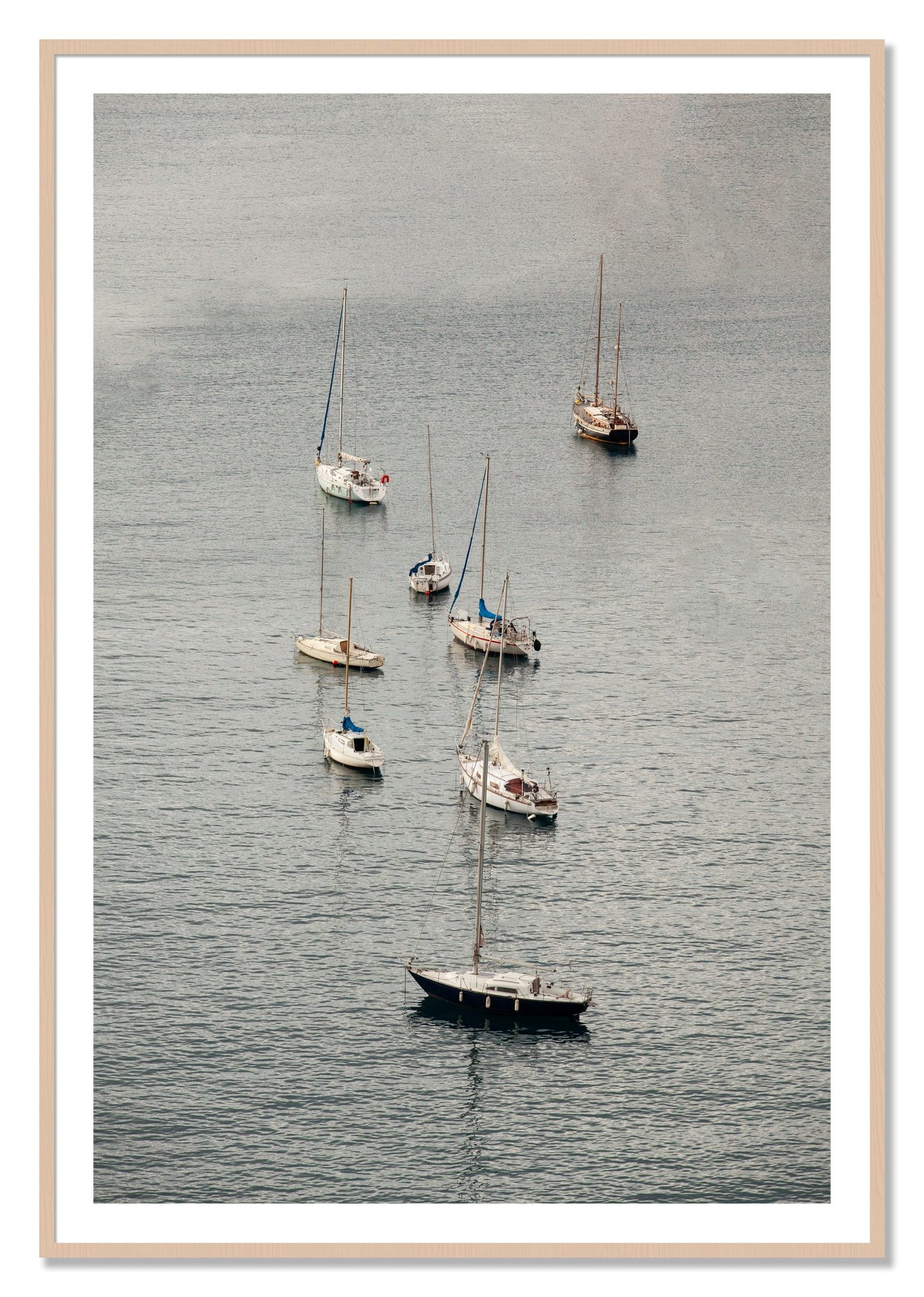 Framed photograph of Anchored by Dylan Ozanich, Maple frame, Borders