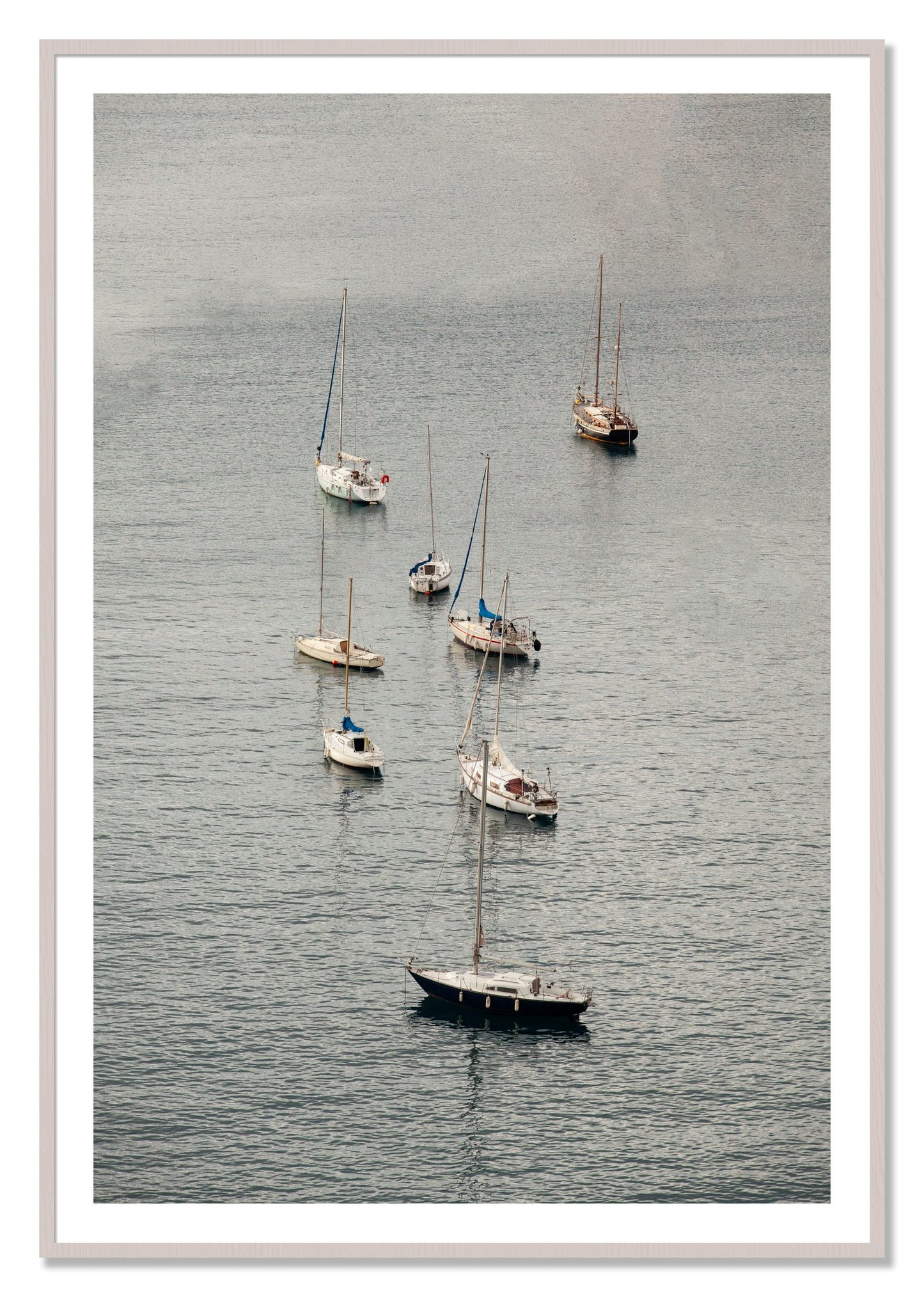 Framed photograph of Anchored by Dylan Ozanich, White Maple frame, Borders