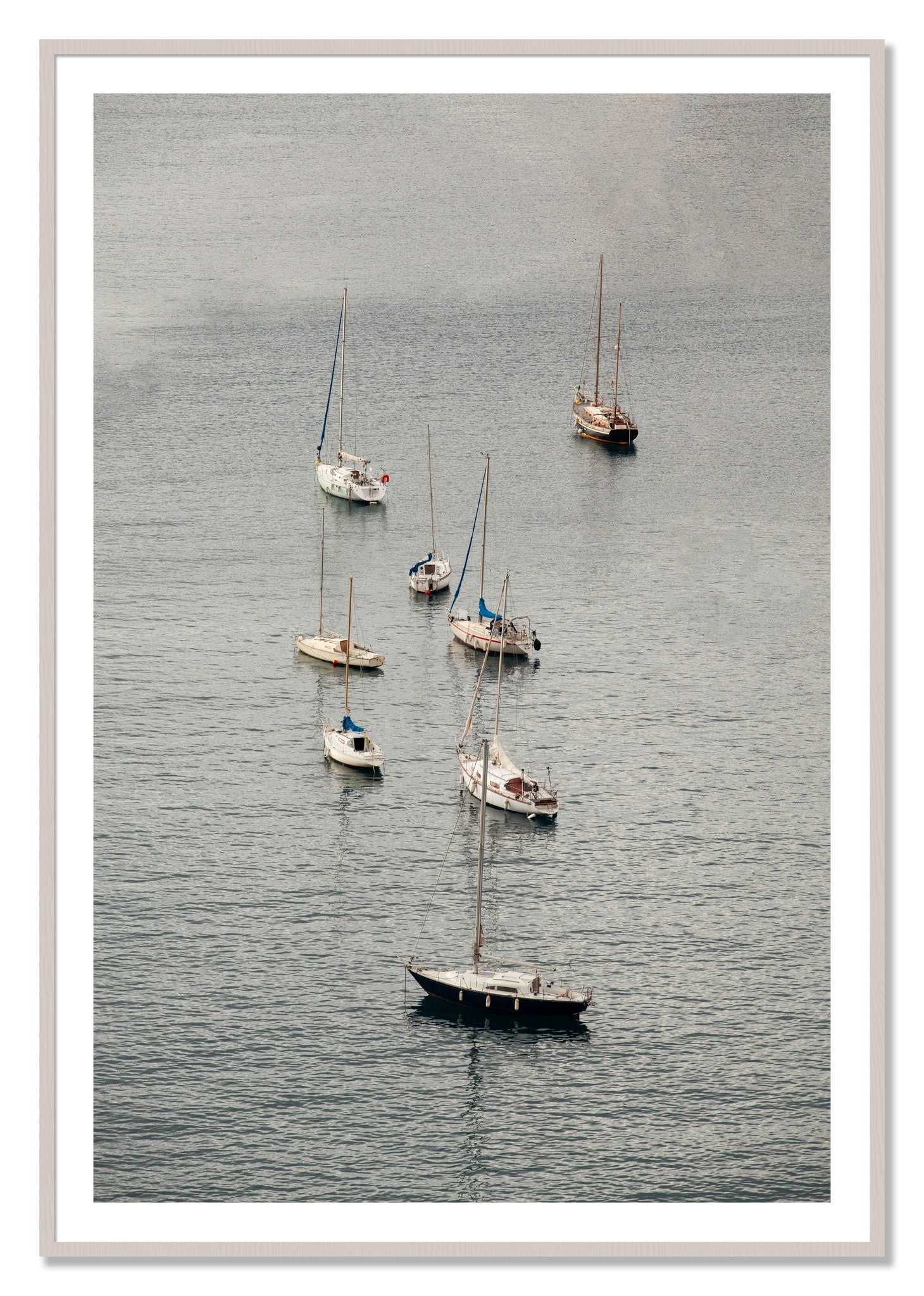 Framed photograph of Anchored by Dylan Ozanich, White Maple frame, Borders