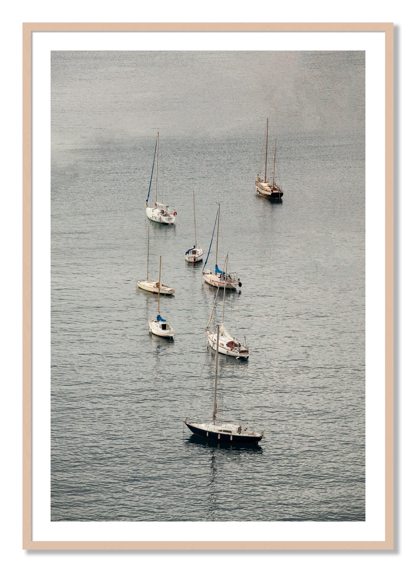 Framed photograph of Anchored by Dylan Ozanich, Maple frame, Borders