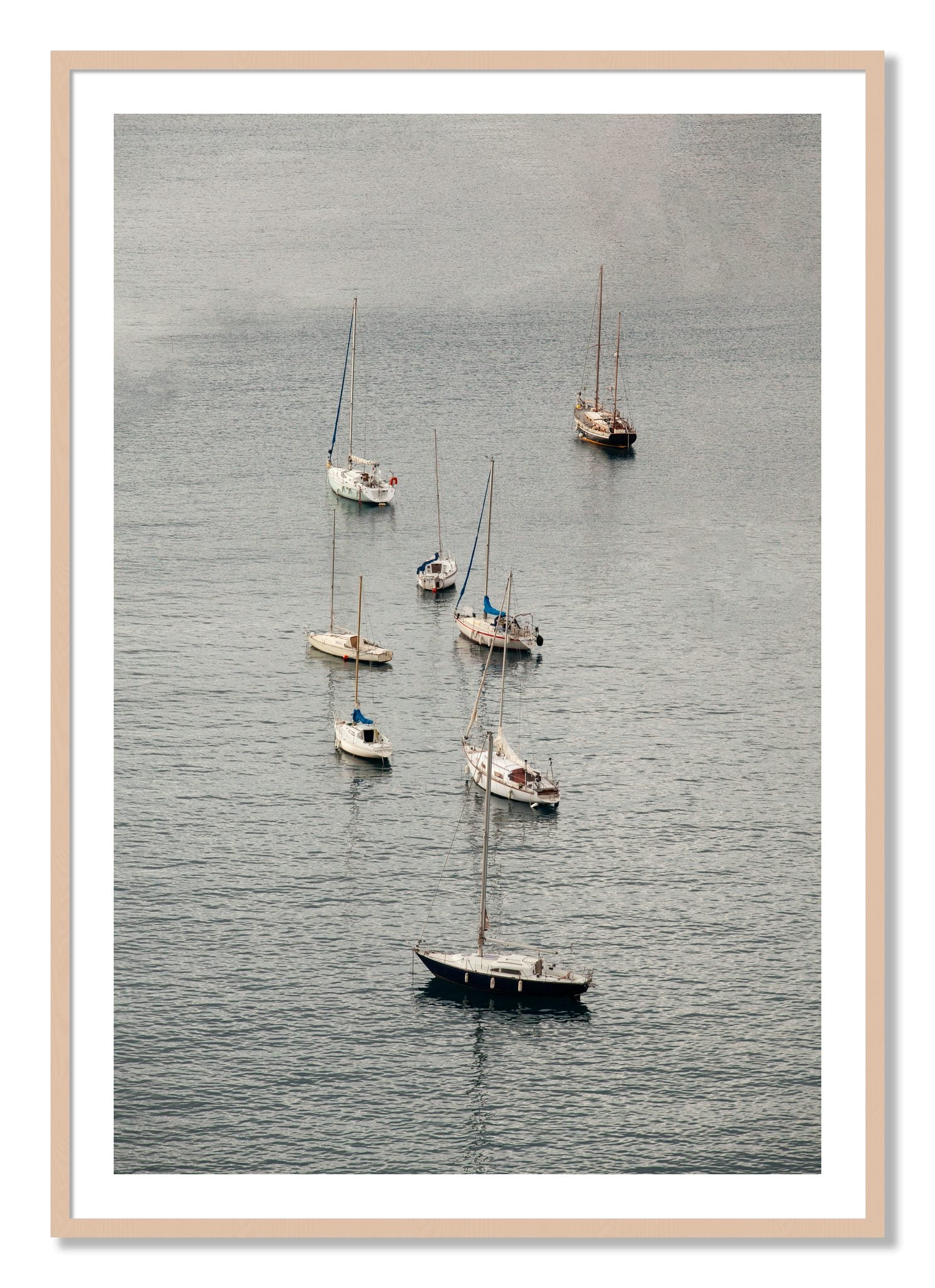 Framed photograph of Anchored by Dylan Ozanich, Maple frame, Borders