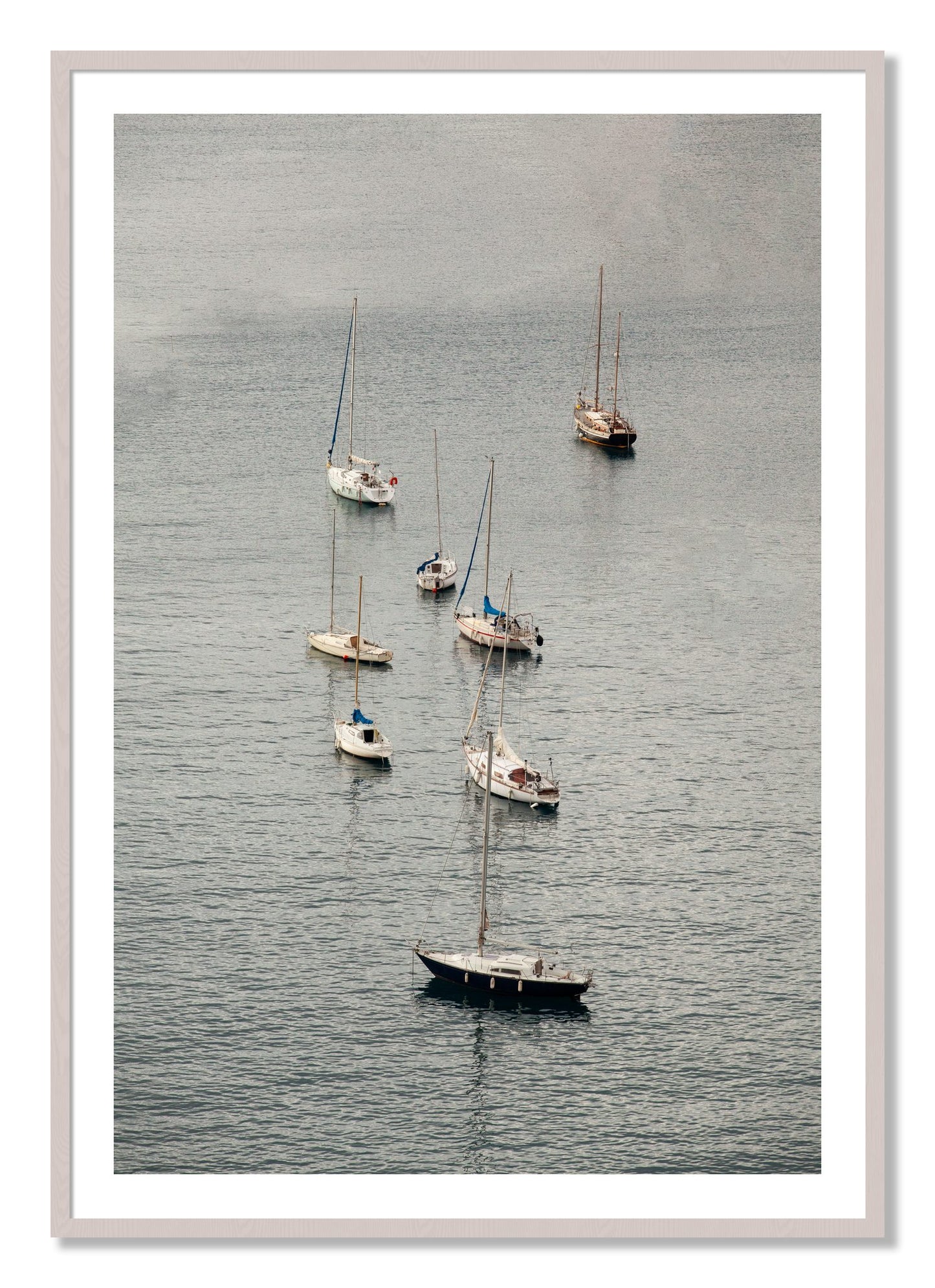 Framed photograph of Anchored by Dylan Ozanich, White Maple frame, Borders