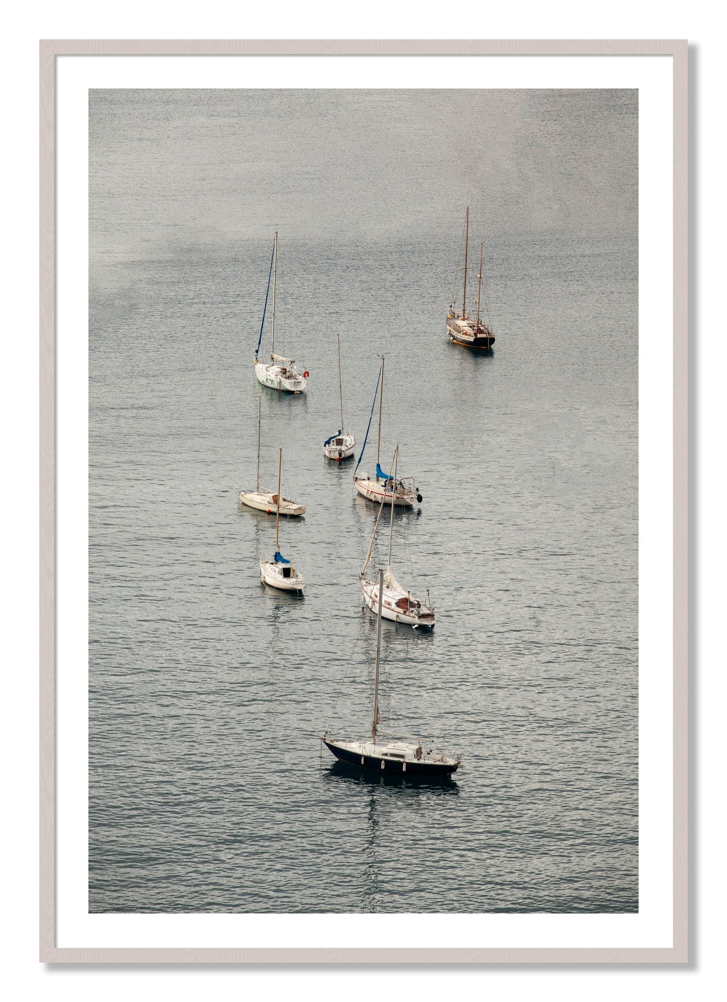 Framed photograph of Anchored by Dylan Ozanich, White Maple frame, Borders