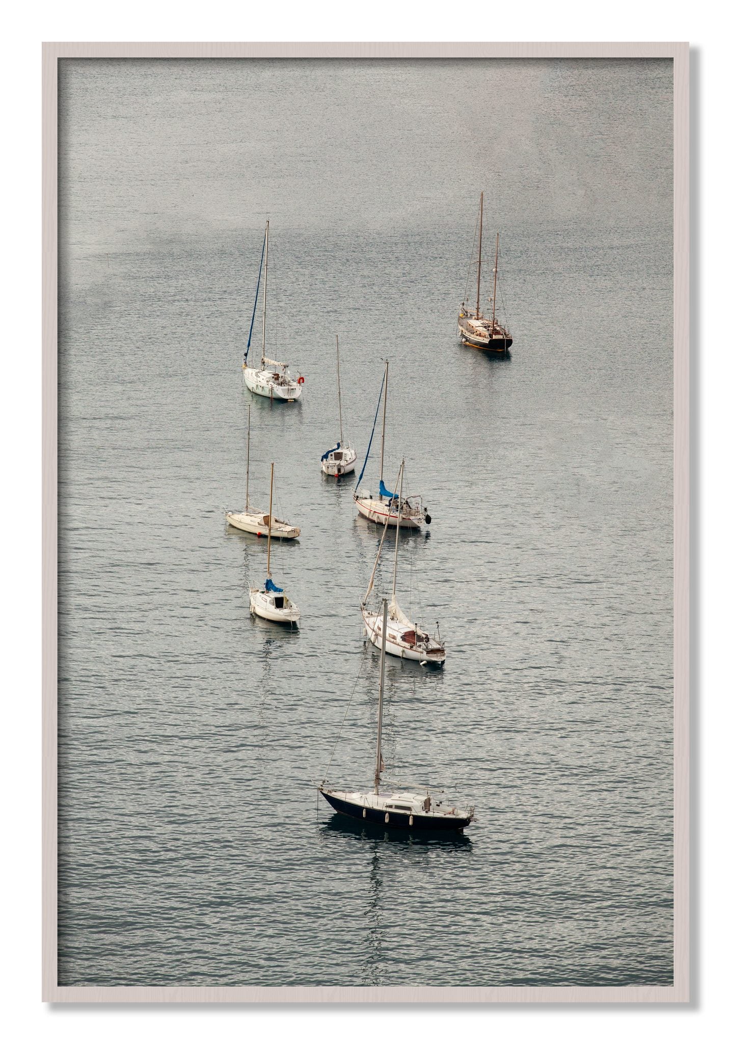 Framed photograph of Anchored by Dylan Ozanich, White Maple frame, Full Bleed