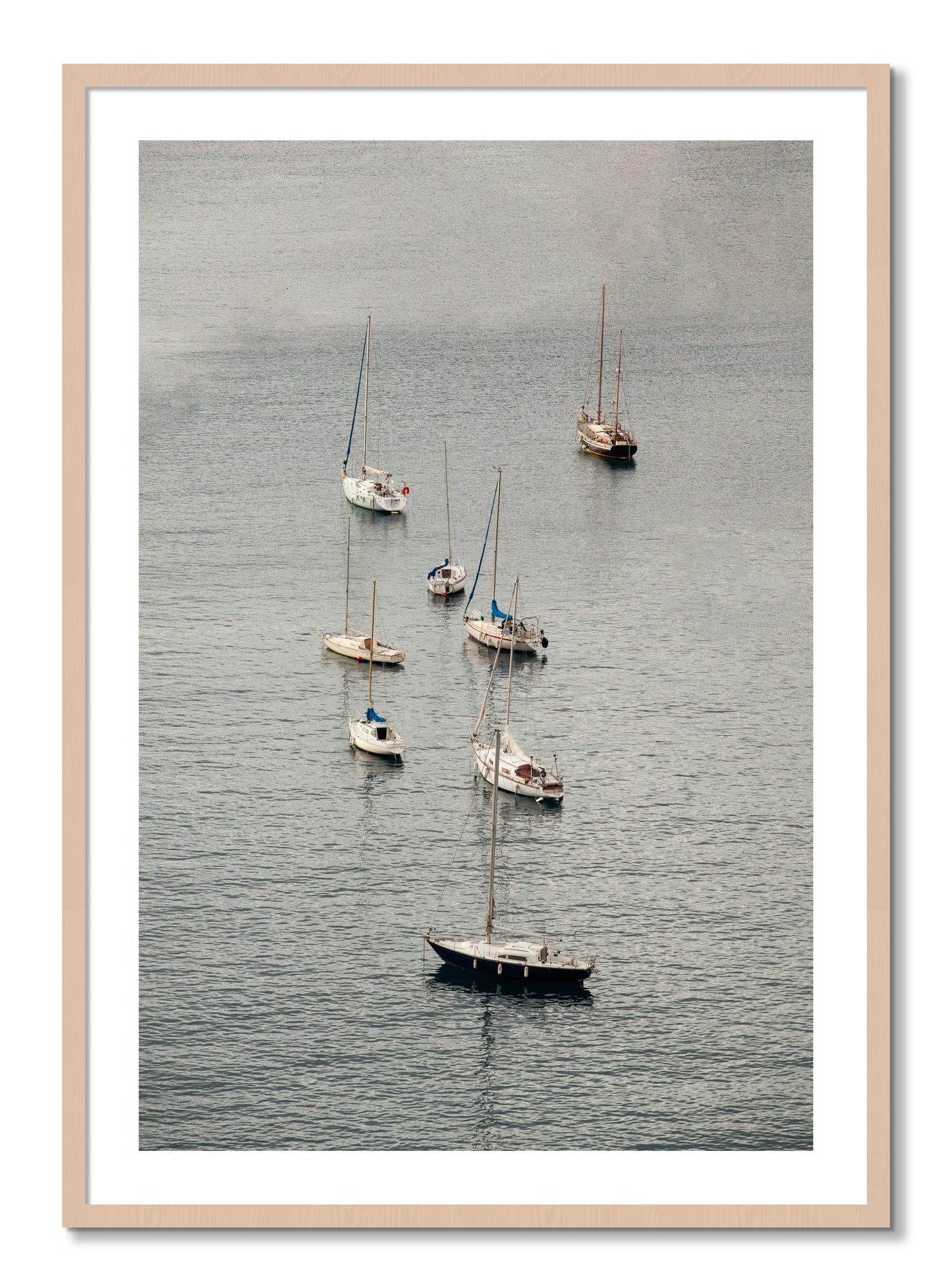 Framed photograph of Anchored by Dylan Ozanich, Maple frame, Borders