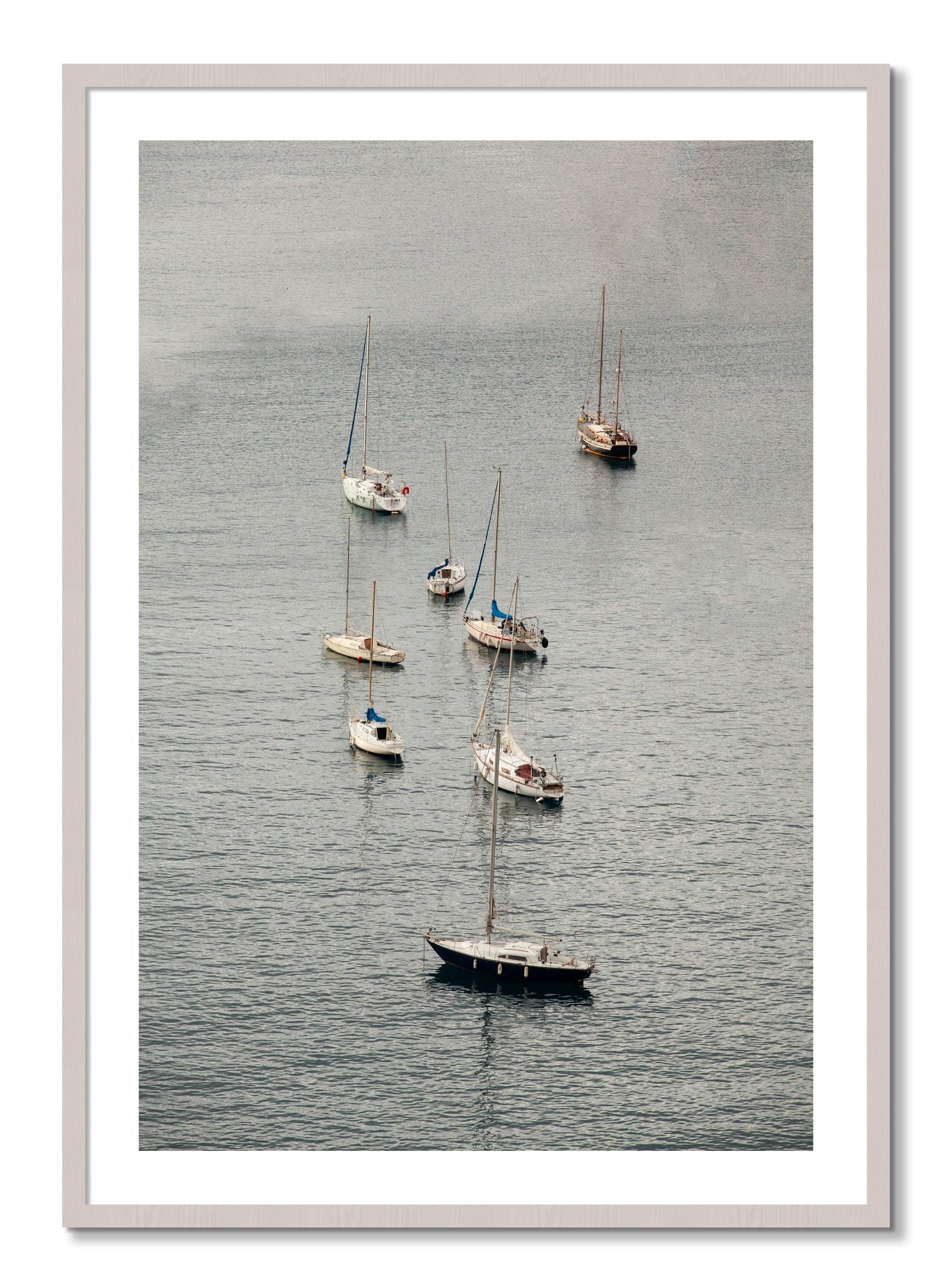 Framed photograph of Anchored by Dylan Ozanich, White Maple frame, Borders