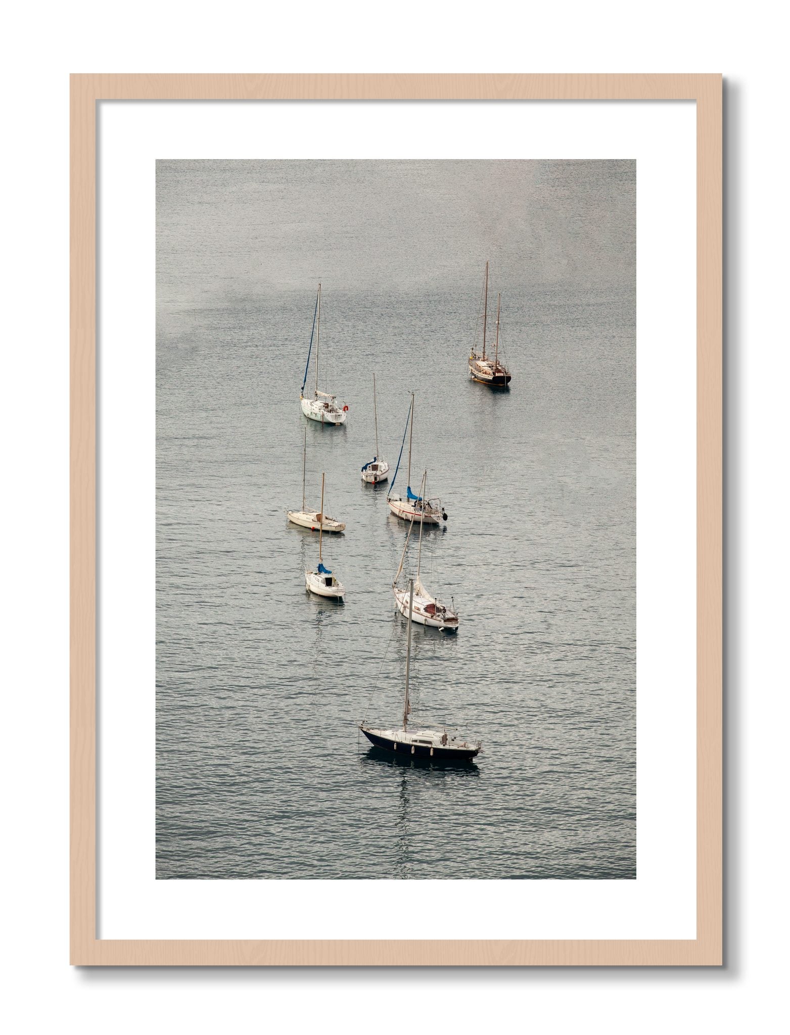 Framed photograph of Anchored by Dylan Ozanich, Maple frame, Borders