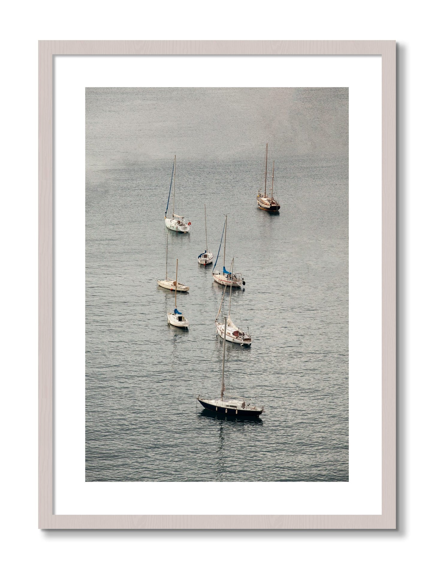 Framed photograph of Anchored by Dylan Ozanich, White Maple frame, Borders