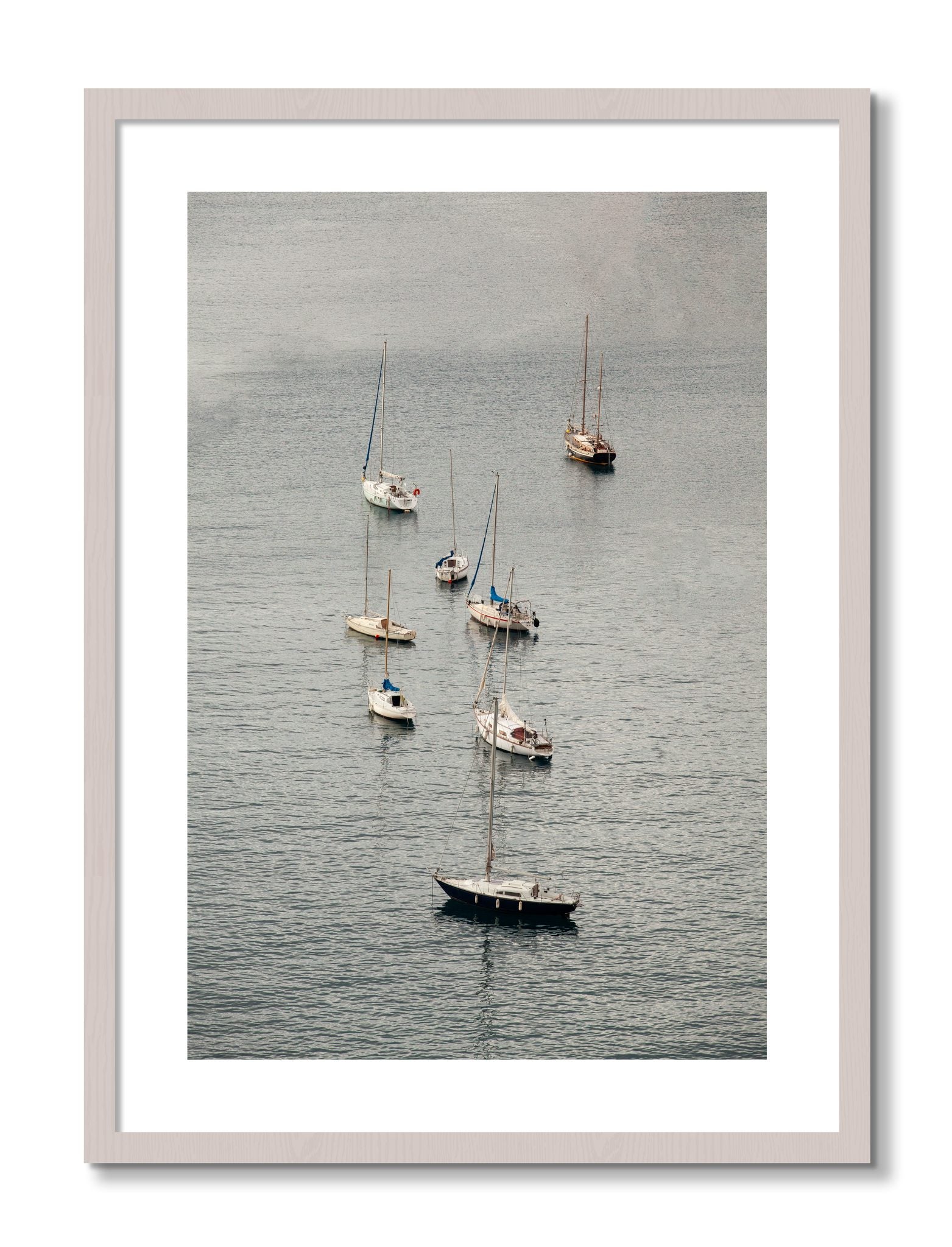 Framed photograph of Anchored by Dylan Ozanich, White Maple frame, Borders