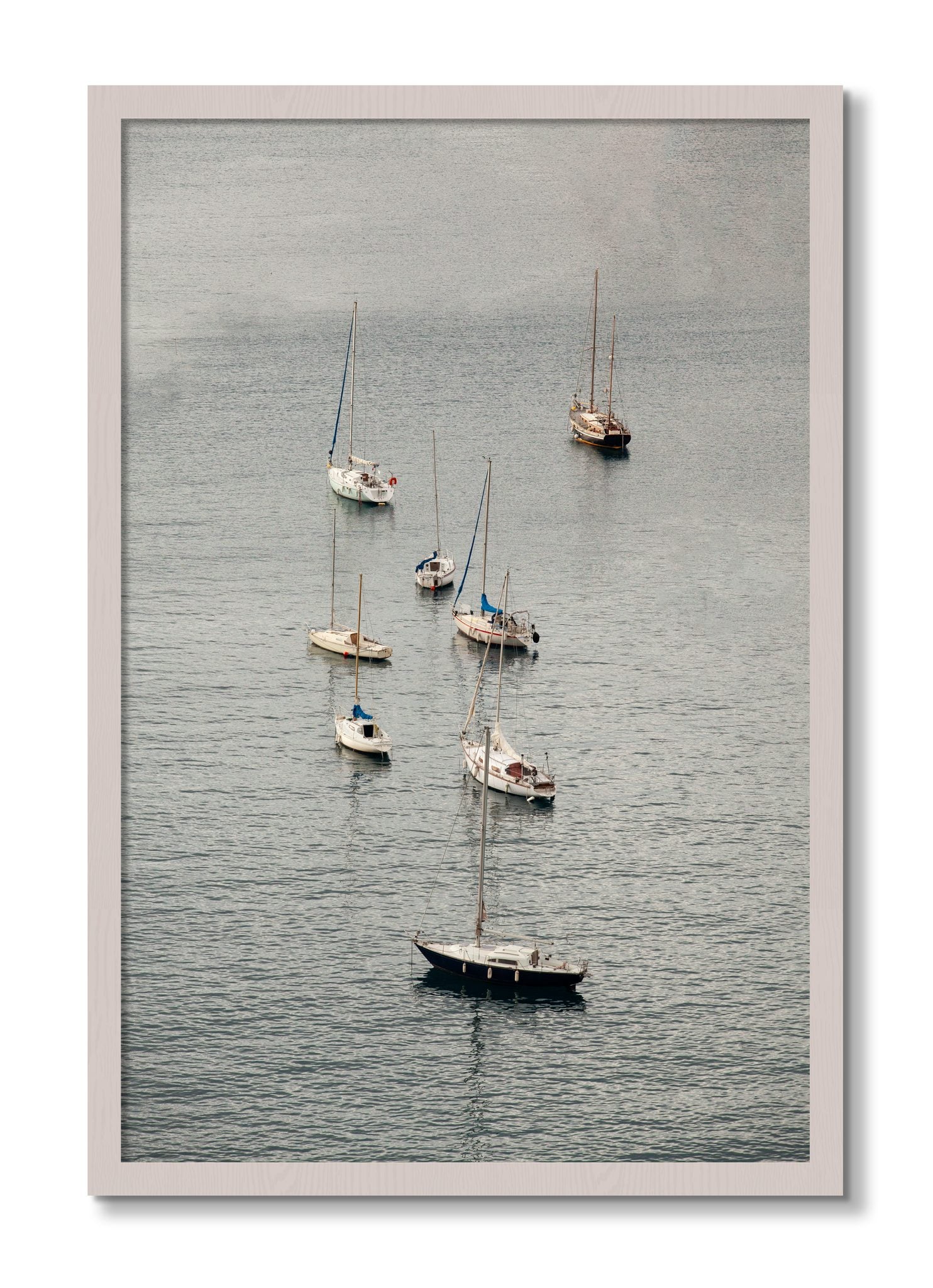 Framed photograph of Anchored by Dylan Ozanich, White Maple frame, Full Bleed