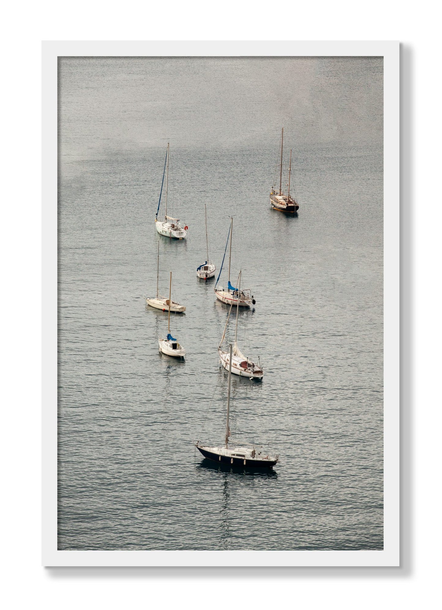 Framed photograph of Anchored by Dylan Ozanich, White frame, Full Bleed