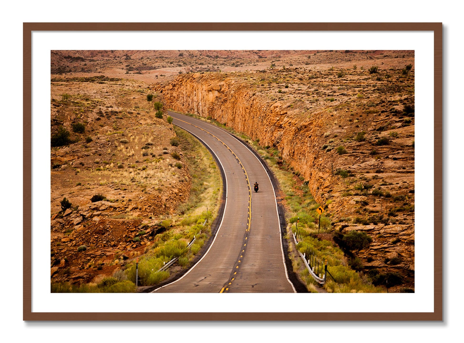 Framed photograph of Around The Turn by Dylan Ozanich, Walnut frame, Borders