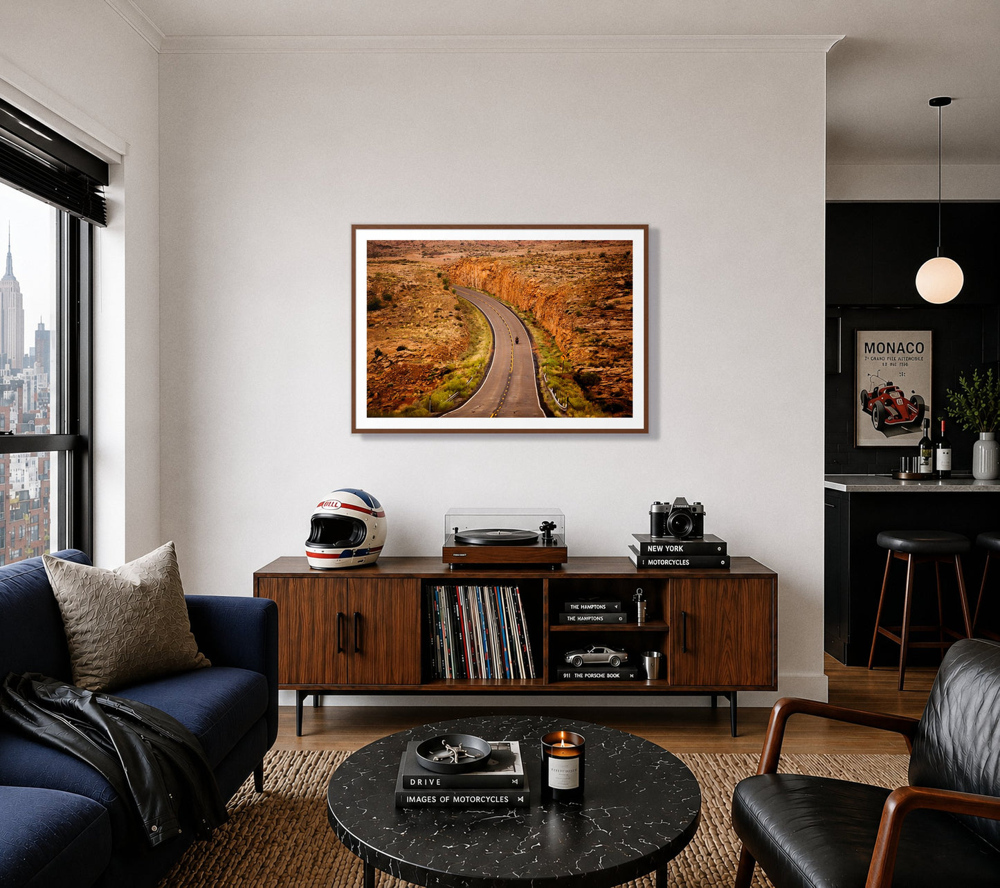 Around The Turn by Dylan Ozanich in a Walnut frame, above a record console in a city apartment with a turntable and vintage helmet