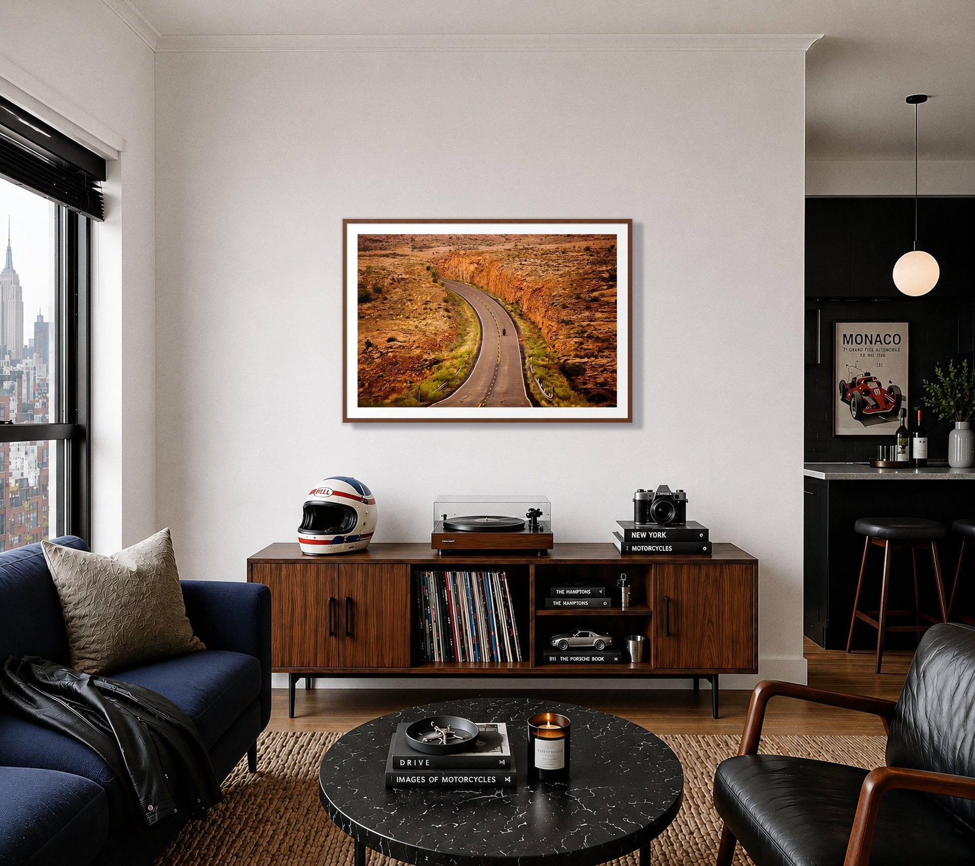 Around The Turn by Dylan Ozanich in a Walnut frame, above a record console in a city apartment with a turntable and vintage helmet