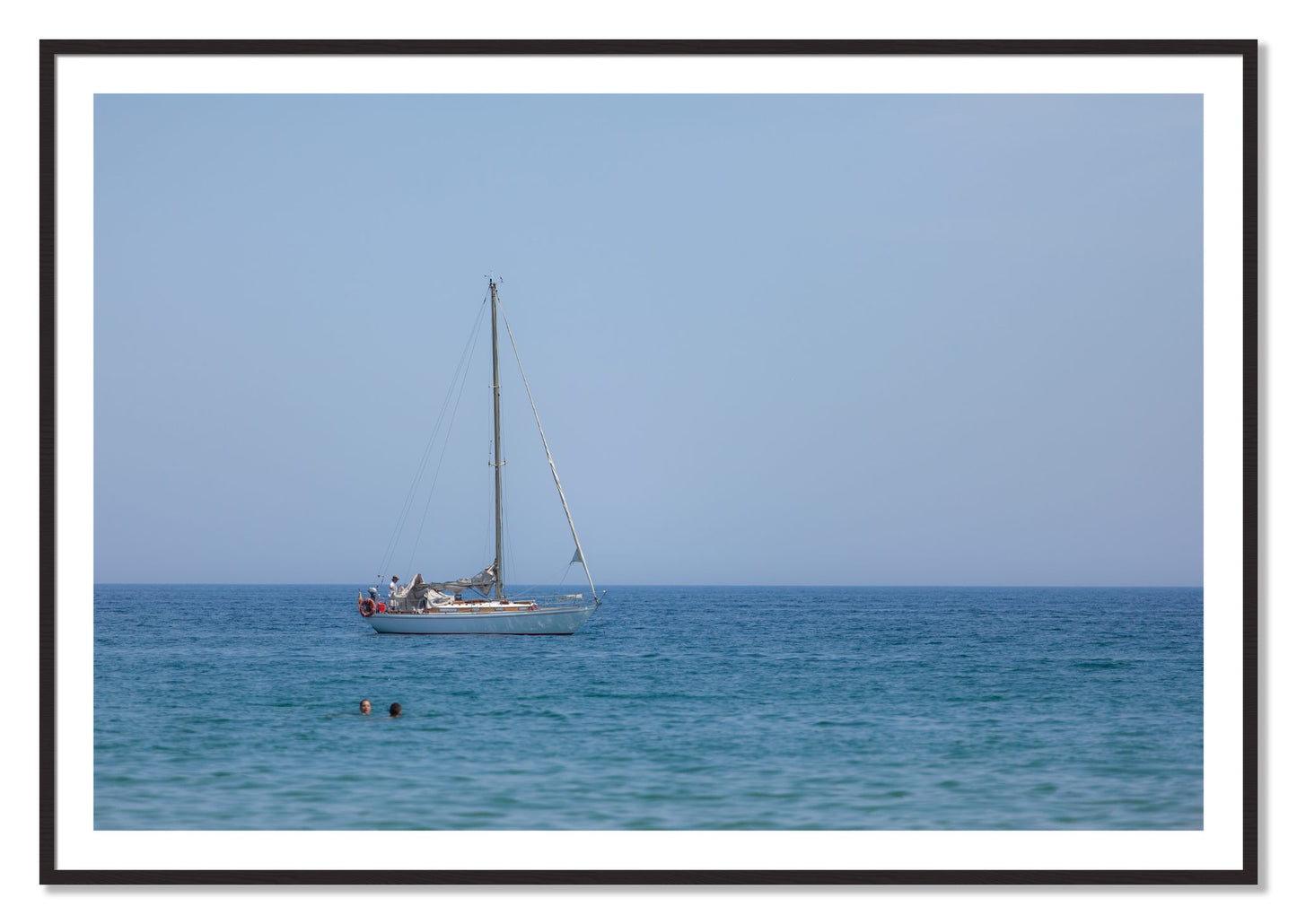 Framed photograph of Barcelona Sea by Dylan Ozanich, Black Walnut frame, Borders