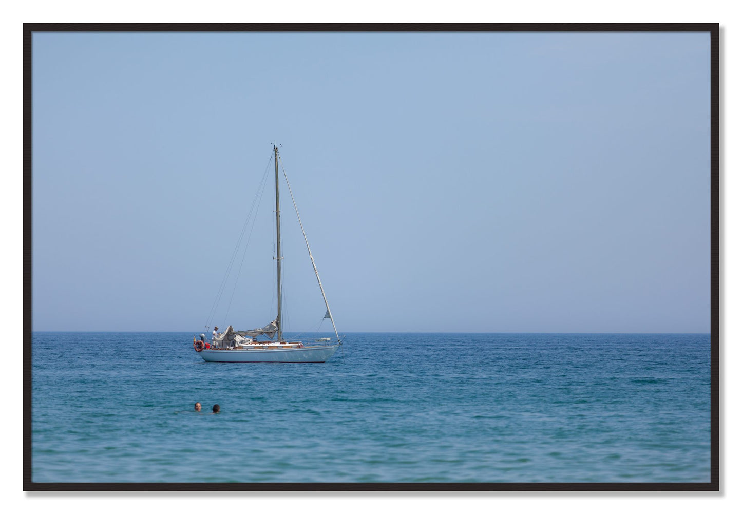 Framed photograph of Barcelona Sea by Dylan Ozanich, Black Walnut frame, Full Bleed
