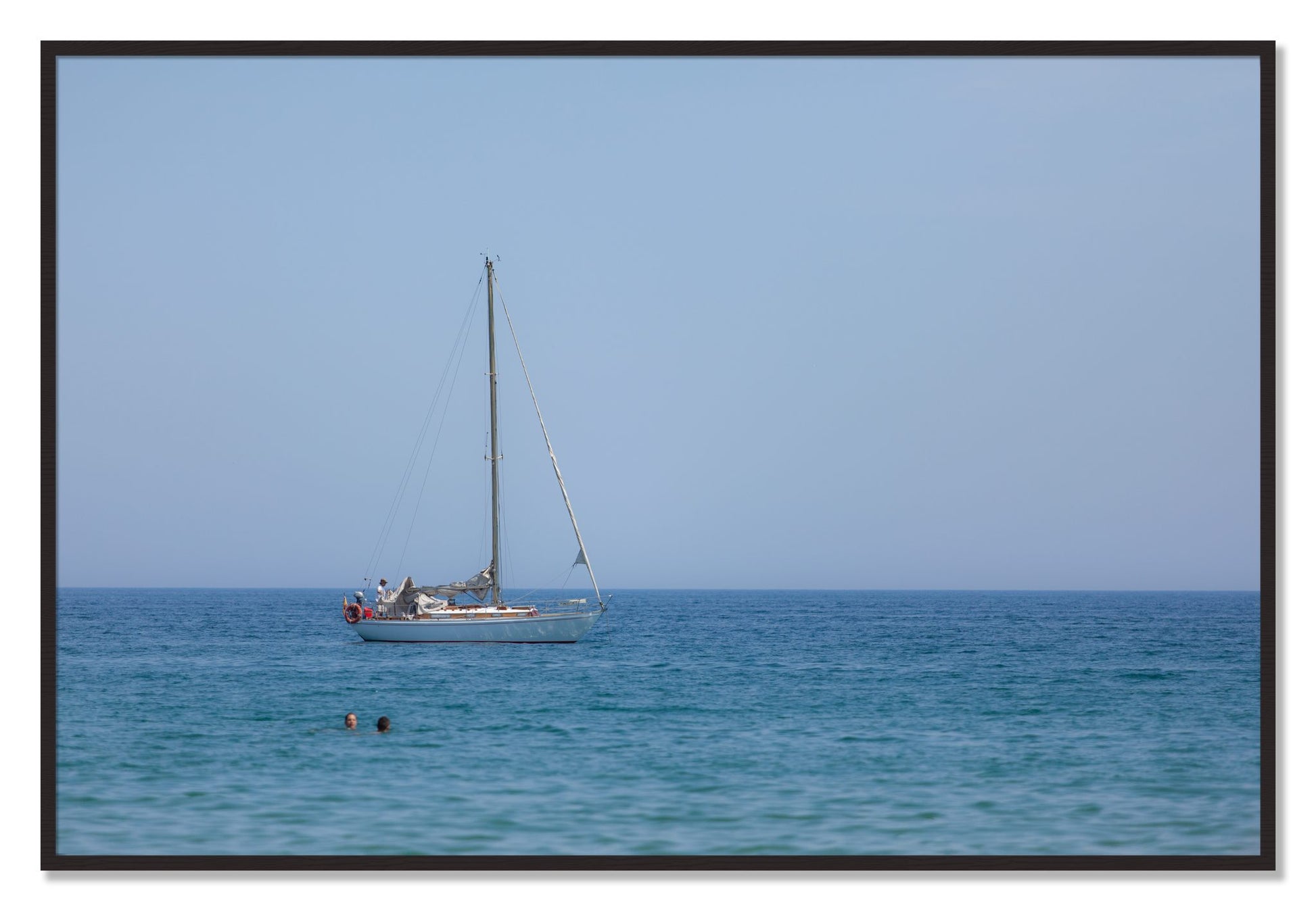 Framed photograph of Barcelona Sea by Dylan Ozanich, Black Walnut frame, Full Bleed