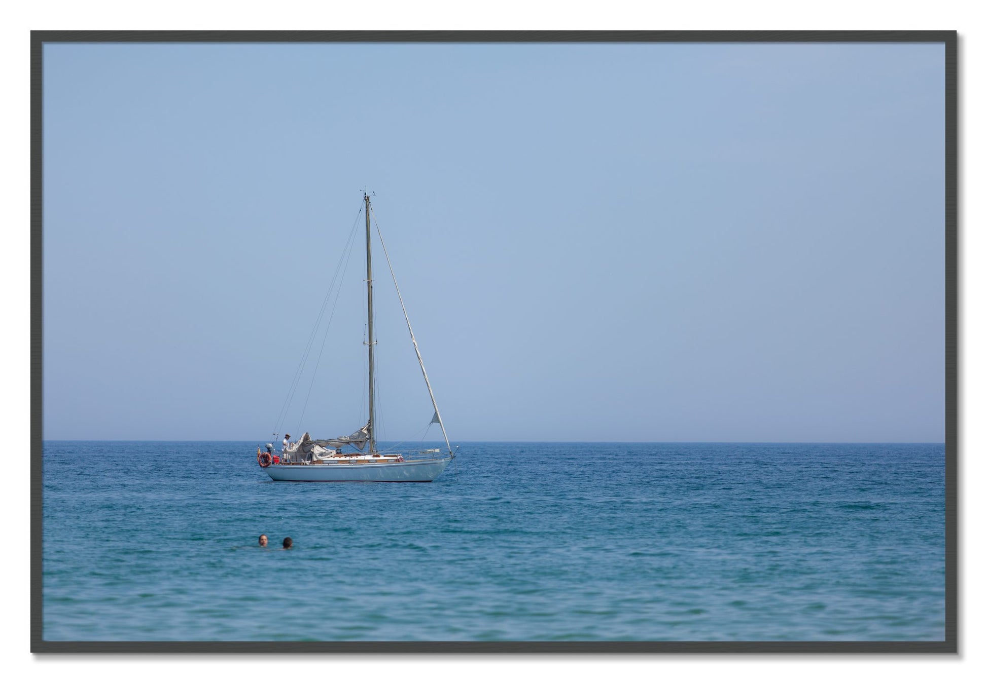 Framed photograph of Barcelona Sea by Dylan Ozanich, Grey frame, Full Bleed