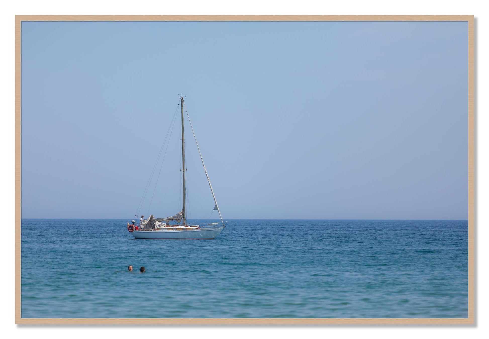 Framed photograph of Barcelona Sea by Dylan Ozanich, Oak frame, Full Bleed