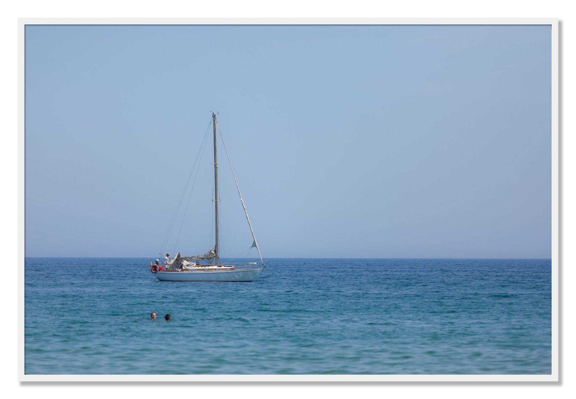 Framed photograph of Barcelona Sea by Dylan Ozanich, White frame, Full Bleed