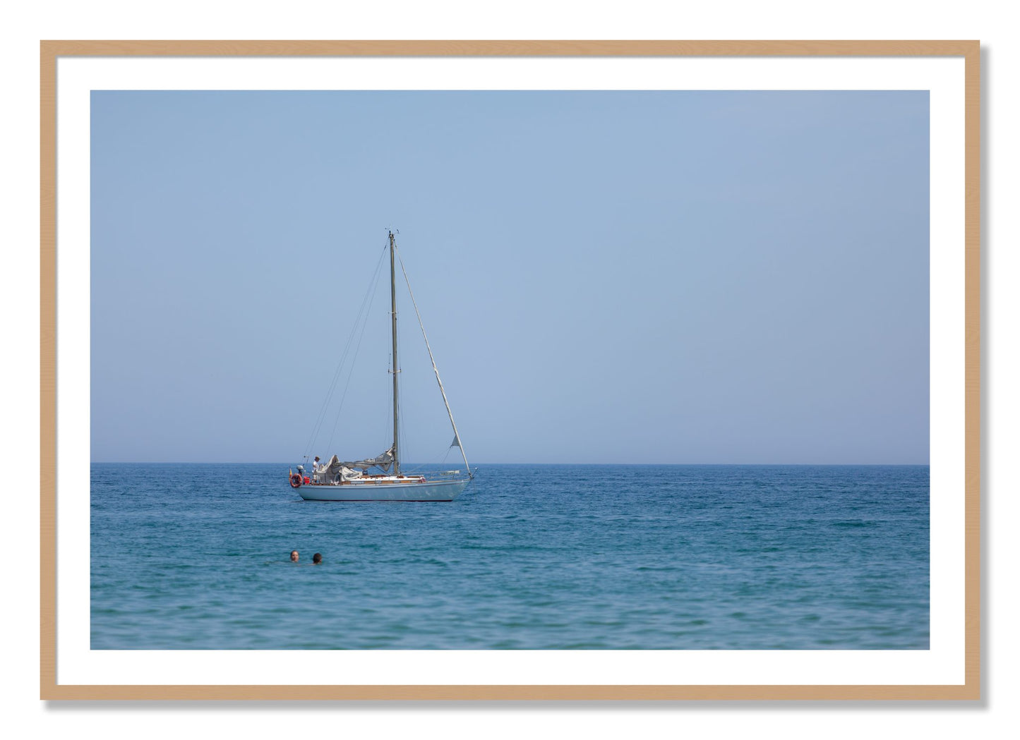 Framed photograph of Barcelona Sea by Dylan Ozanich, Oak frame, Borders