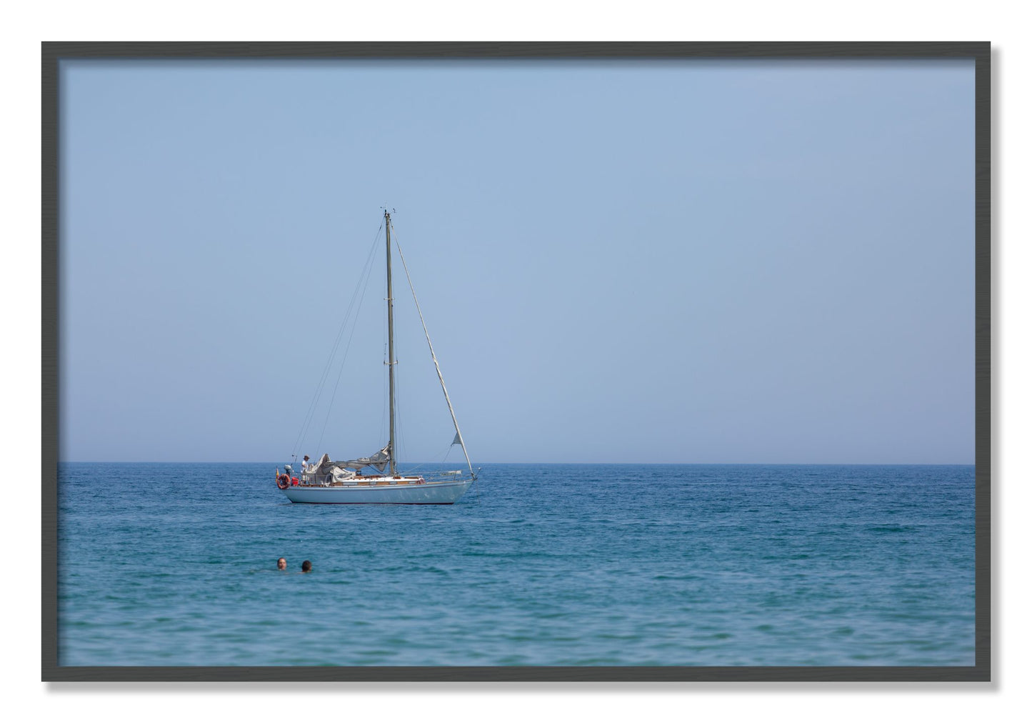 Framed photograph of Barcelona Sea by Dylan Ozanich, Grey frame, Full Bleed