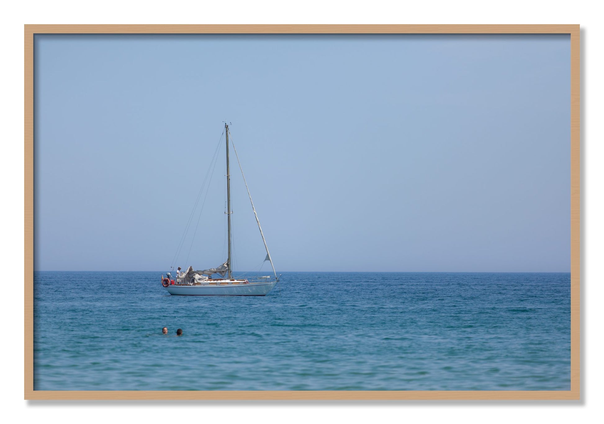 Framed photograph of Barcelona Sea by Dylan Ozanich, Oak frame, Full Bleed