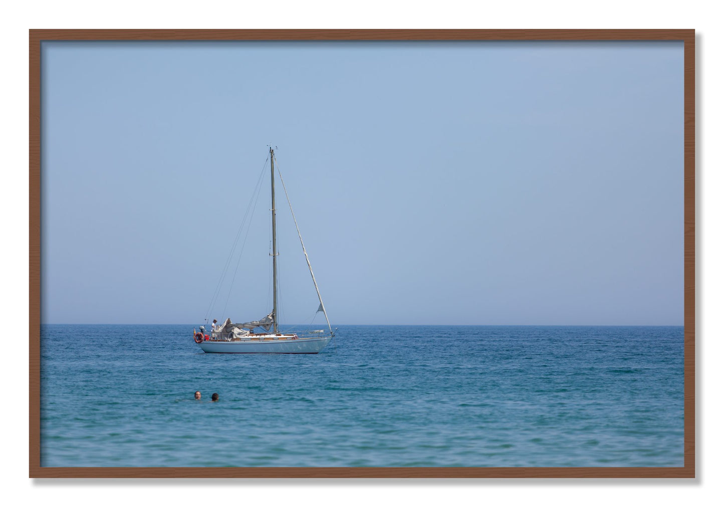 Framed photograph of Barcelona Sea by Dylan Ozanich, Walnut frame, Full Bleed