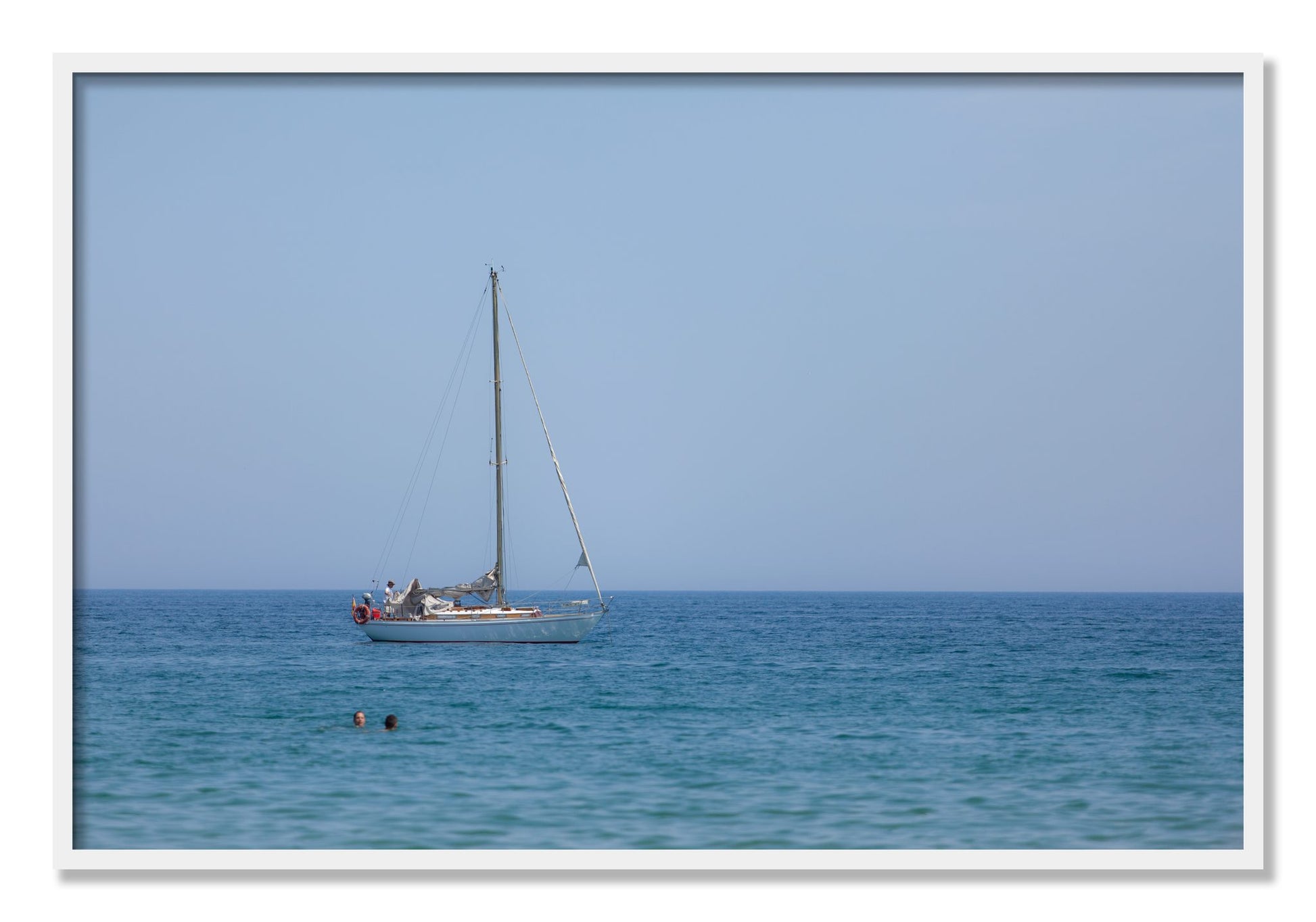Framed photograph of Barcelona Sea by Dylan Ozanich, White frame, Full Bleed