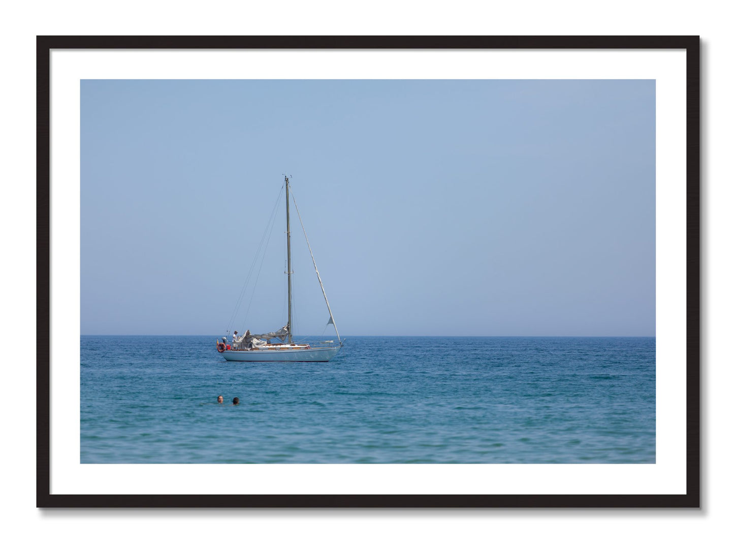 Framed photograph of Barcelona Sea by Dylan Ozanich, Black Walnut frame, Borders