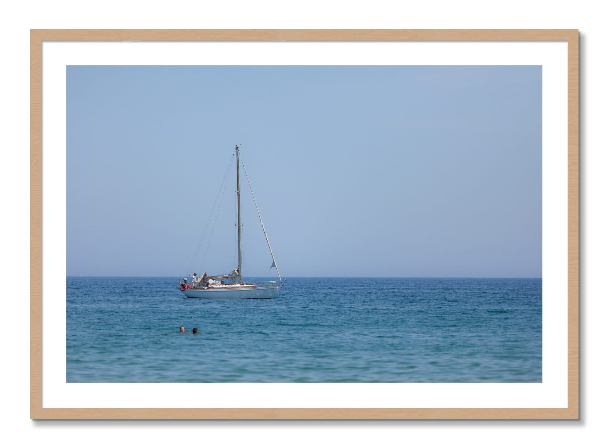 Framed photograph of Barcelona Sea by Dylan Ozanich, Oak frame, Borders