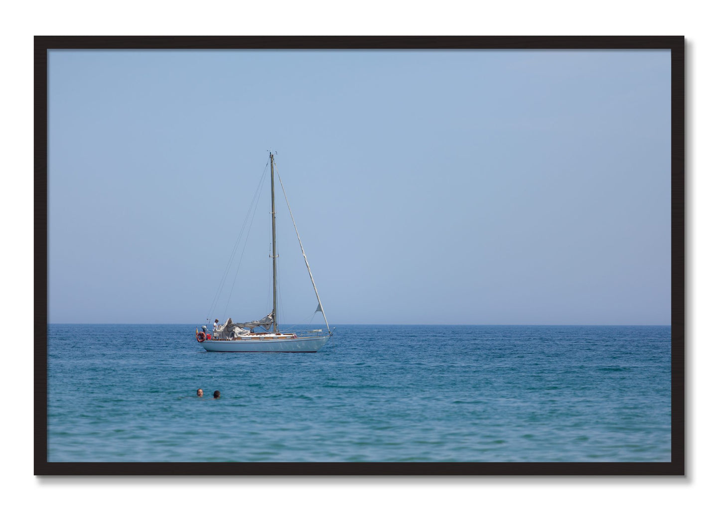 Framed photograph of Barcelona Sea by Dylan Ozanich, Black Walnut frame, Full Bleed