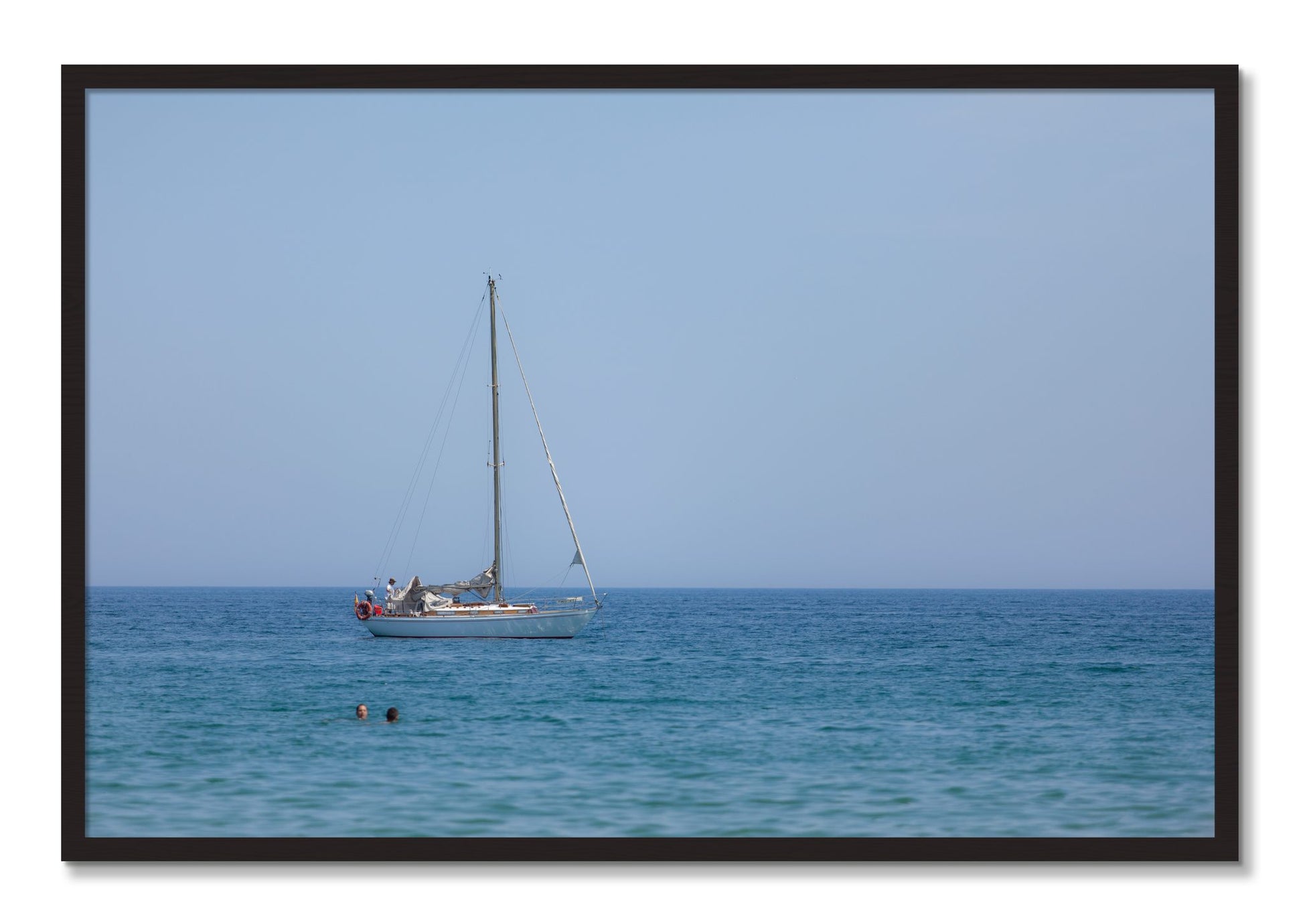 Framed photograph of Barcelona Sea by Dylan Ozanich, Black Walnut frame, Full Bleed