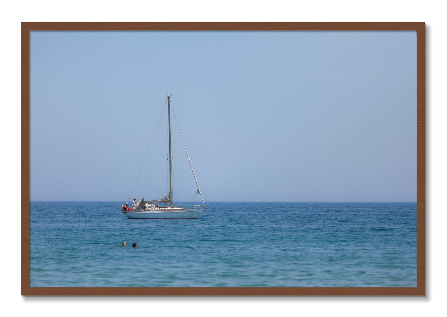 Framed photograph of Barcelona Sea by Dylan Ozanich, Walnut frame, Full Bleed