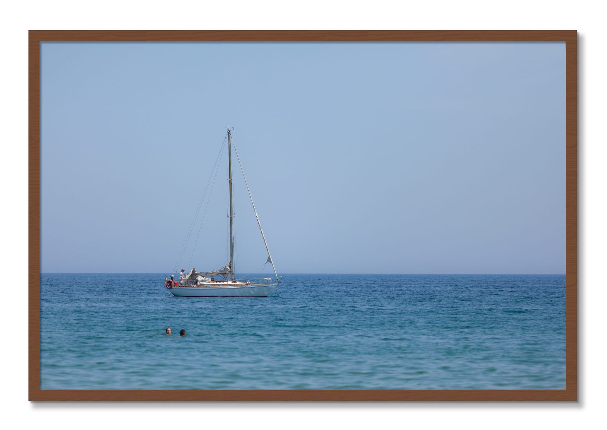 Framed photograph of Barcelona Sea by Dylan Ozanich, Walnut frame, Full Bleed