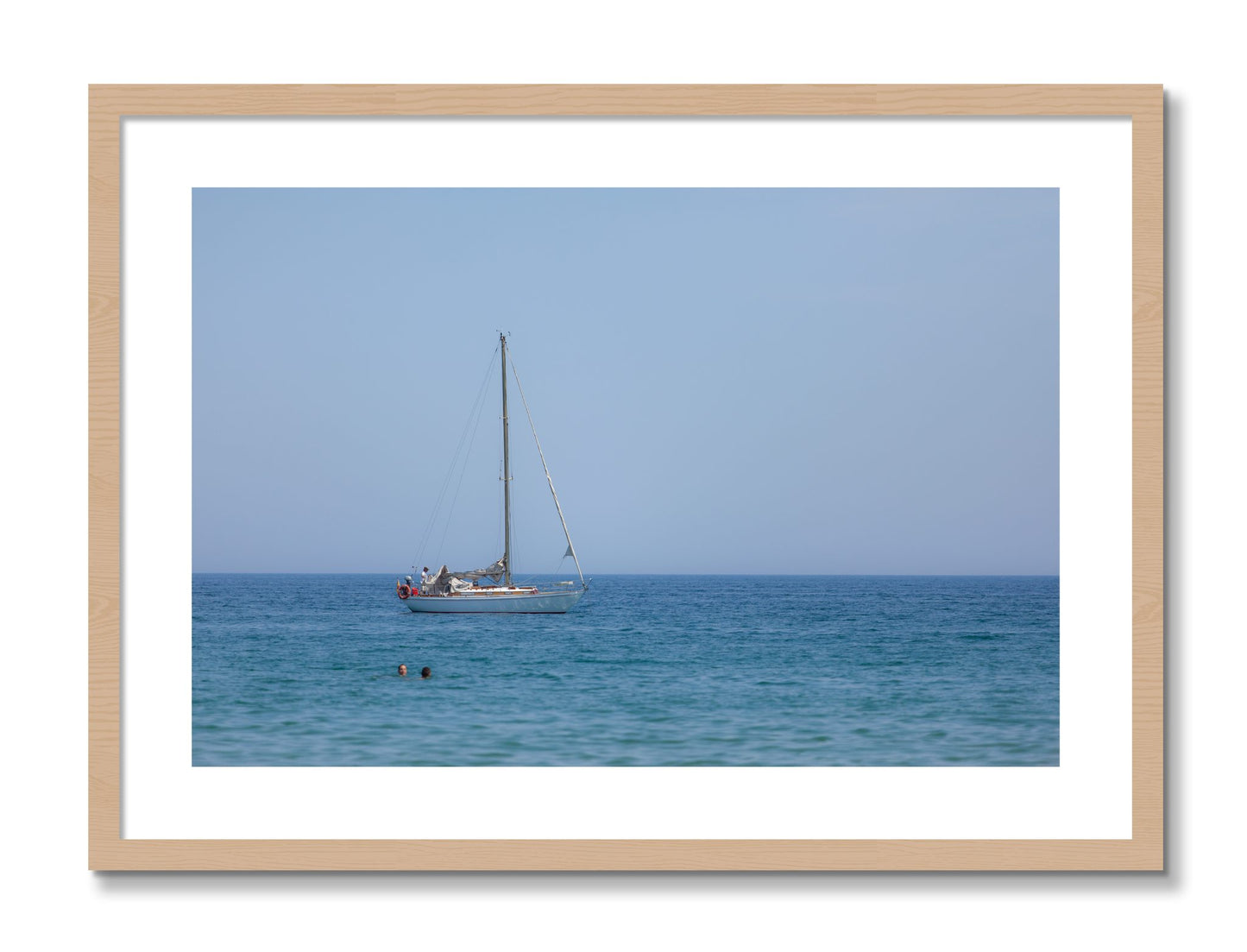 Framed photograph of Barcelona Sea by Dylan Ozanich, Oak frame, Borders