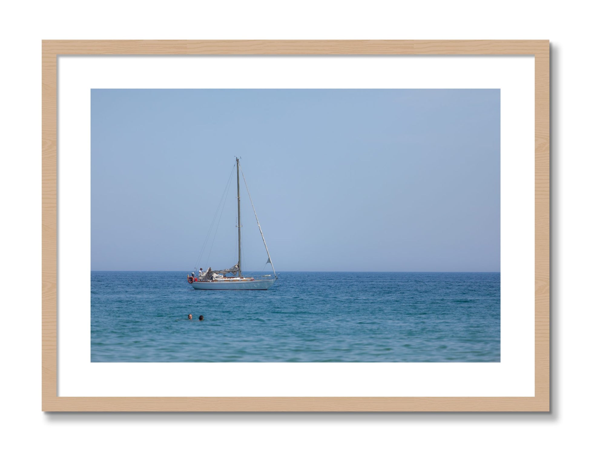 Framed photograph of Barcelona Sea by Dylan Ozanich, Oak frame, Borders