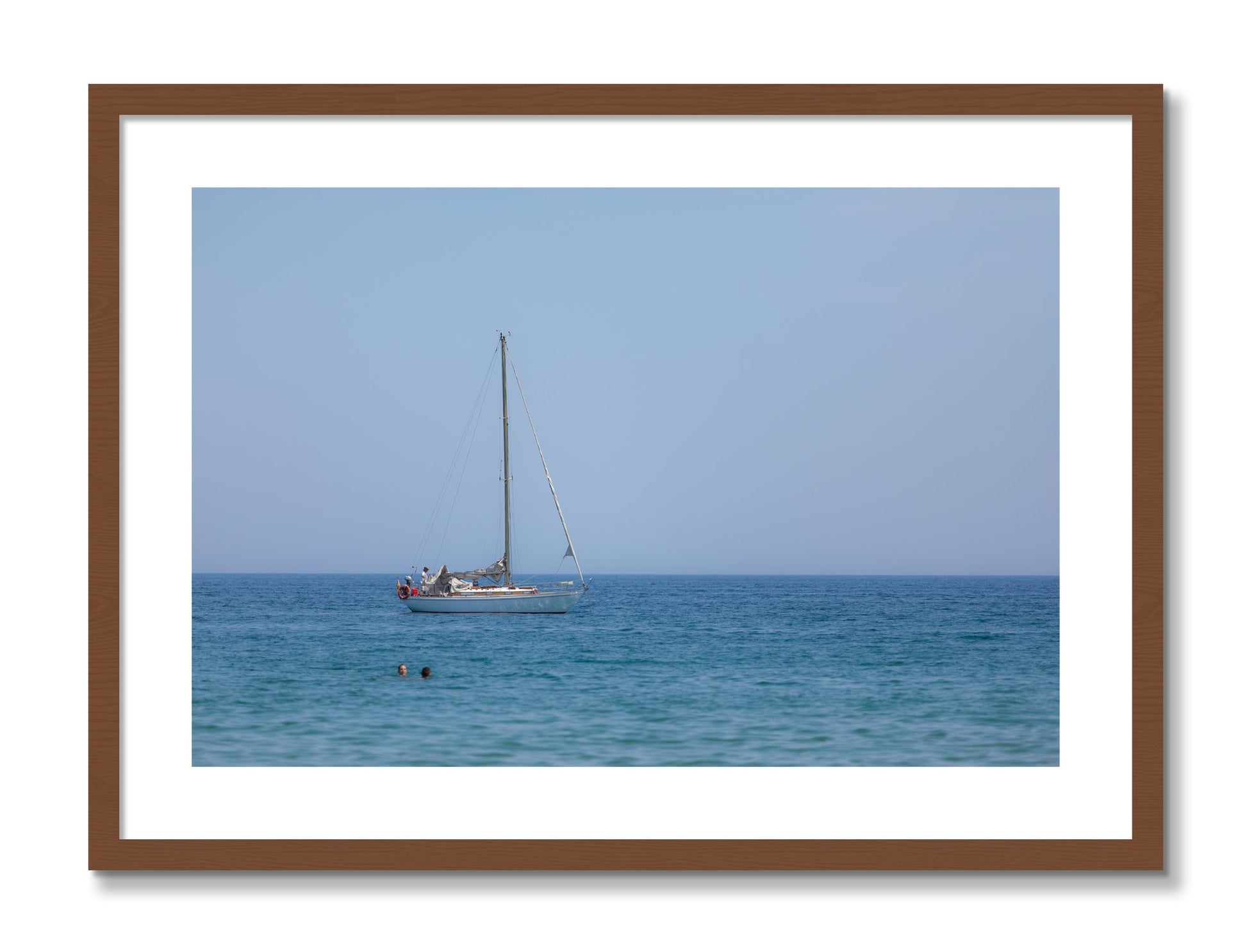 Framed photograph of Barcelona Sea by Dylan Ozanich, Walnut frame, Borders