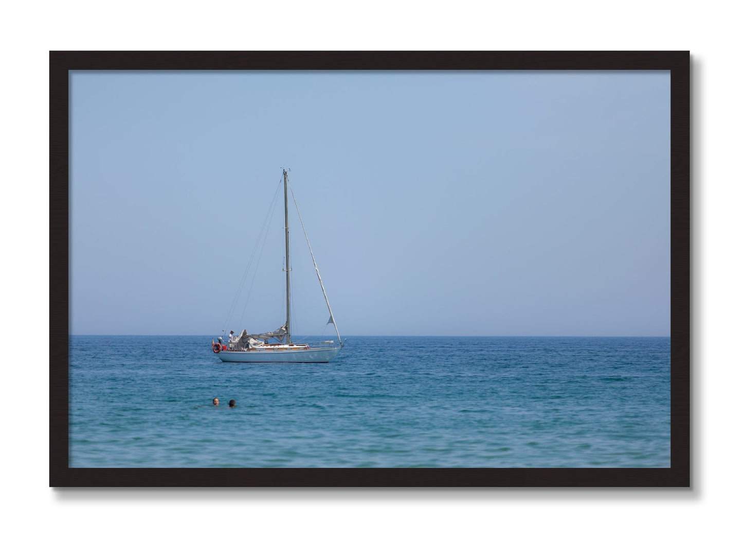 Framed photograph of Barcelona Sea by Dylan Ozanich, Black Walnut frame, Full Bleed