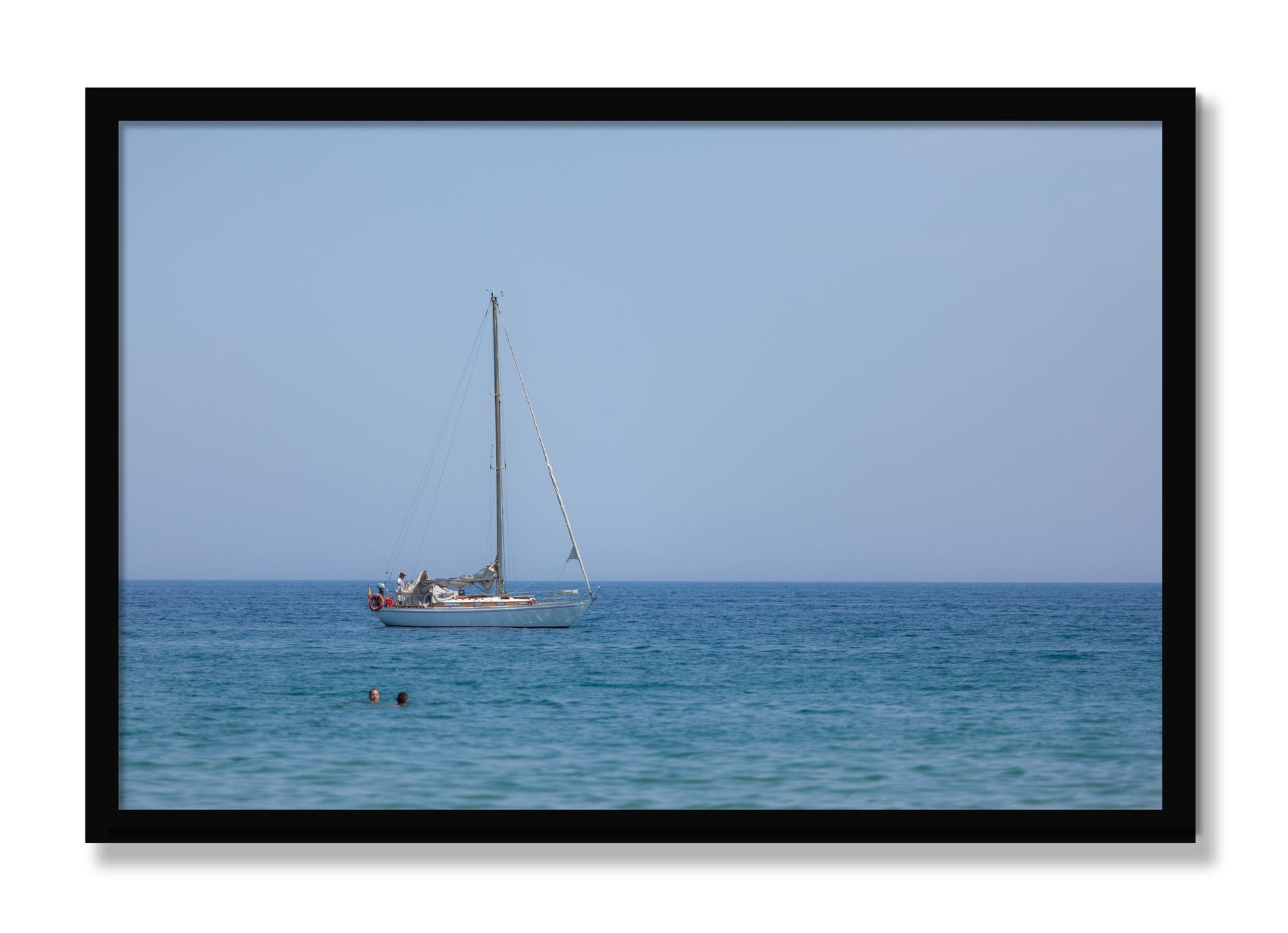 Framed photograph of Barcelona Sea by Dylan Ozanich, Black frame, Full Bleed