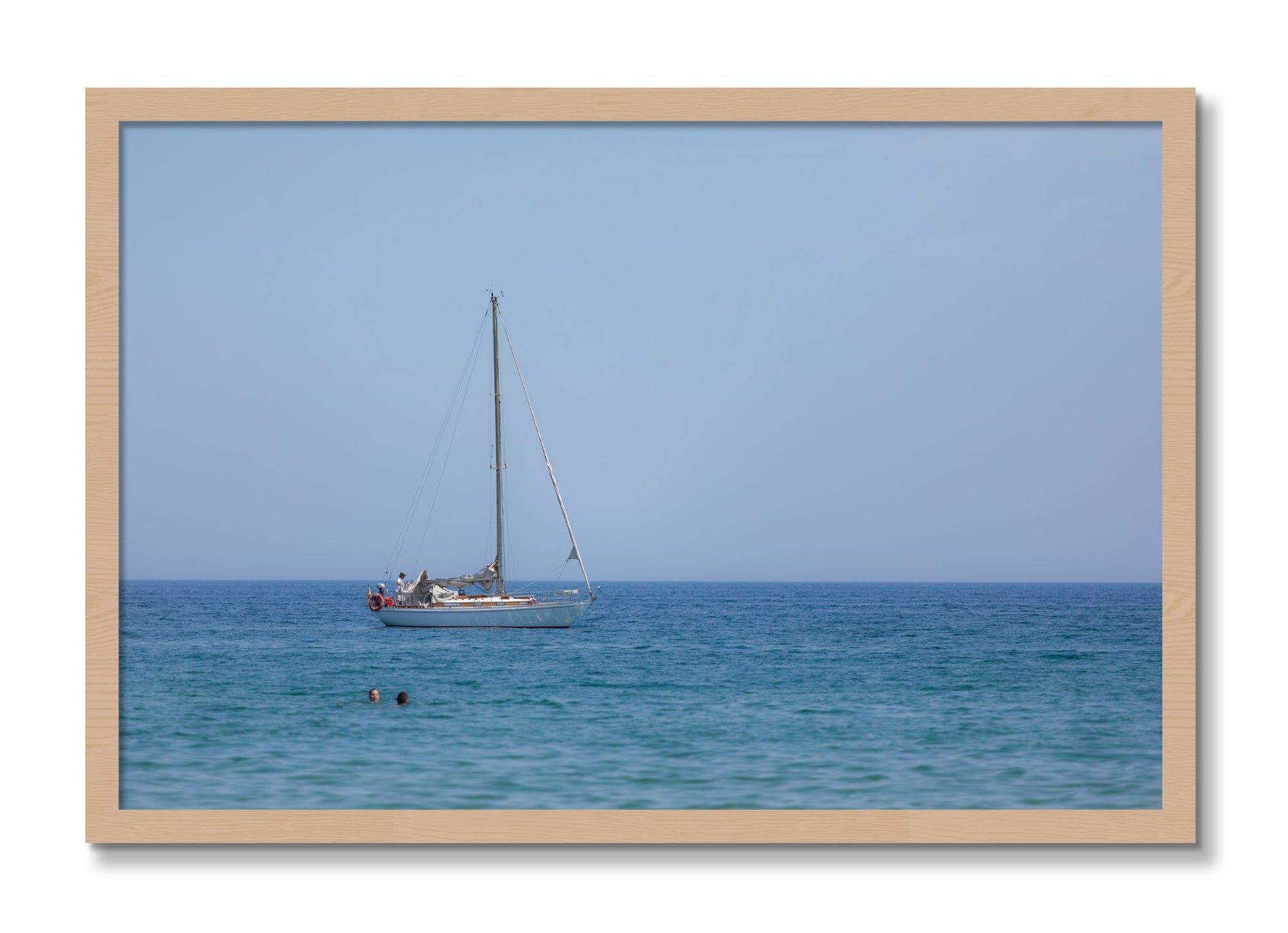 Framed photograph of Barcelona Sea by Dylan Ozanich, Oak frame, Full Bleed