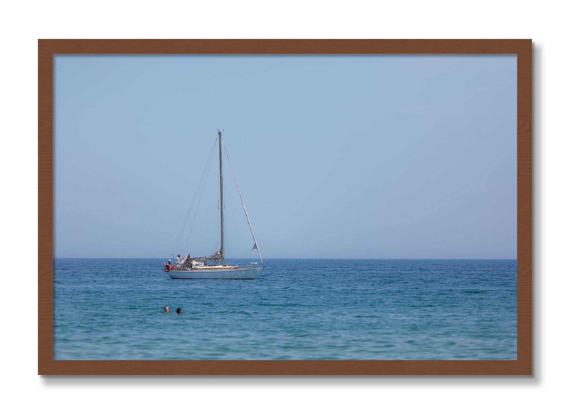 Framed photograph of Barcelona Sea by Dylan Ozanich, Walnut frame, Full Bleed